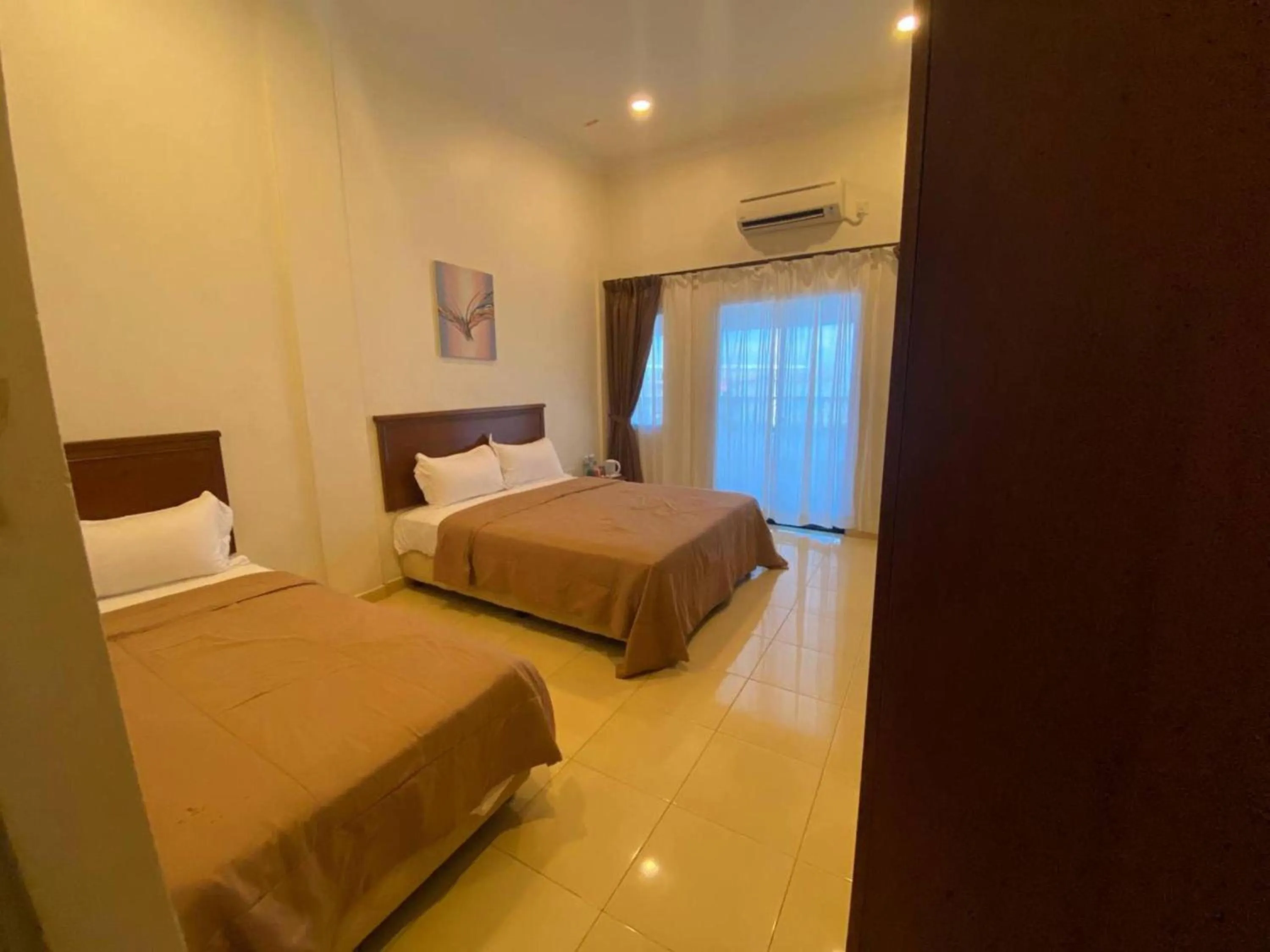 View (from property/room), Bed in Capital O 91094 Hotel & Chalet Sportfishing