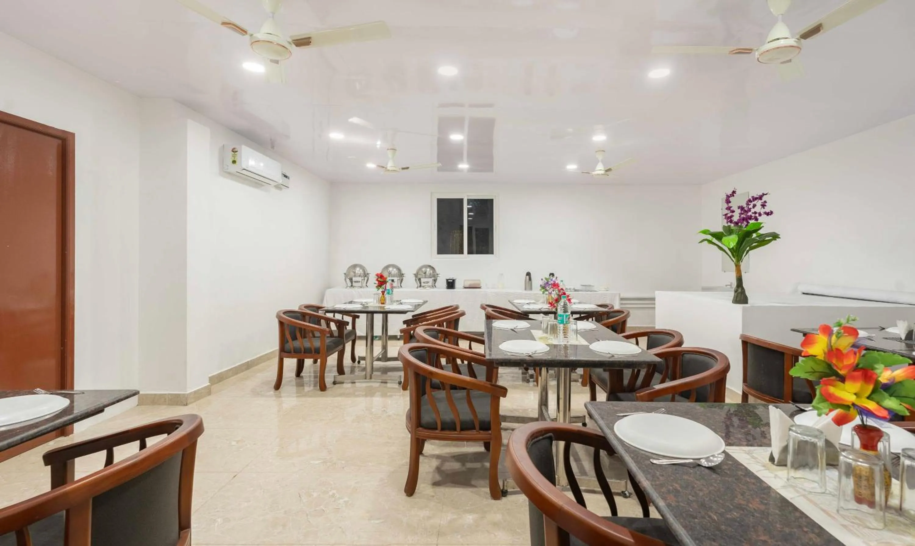 Dining area in Treebo Royal Plaza, 700 Mts From Promenade Beach