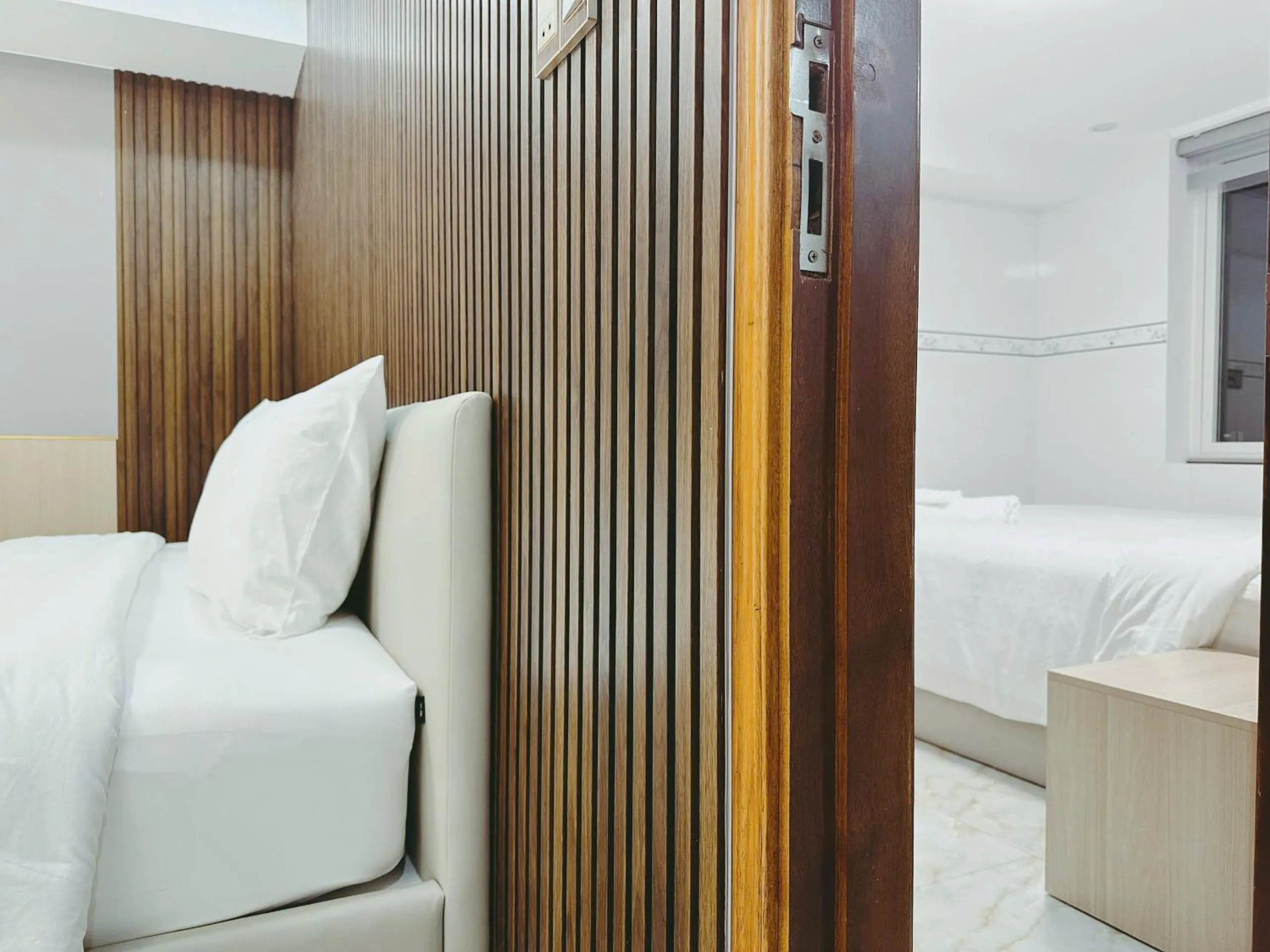 Bed in The One Da Lat Hotel