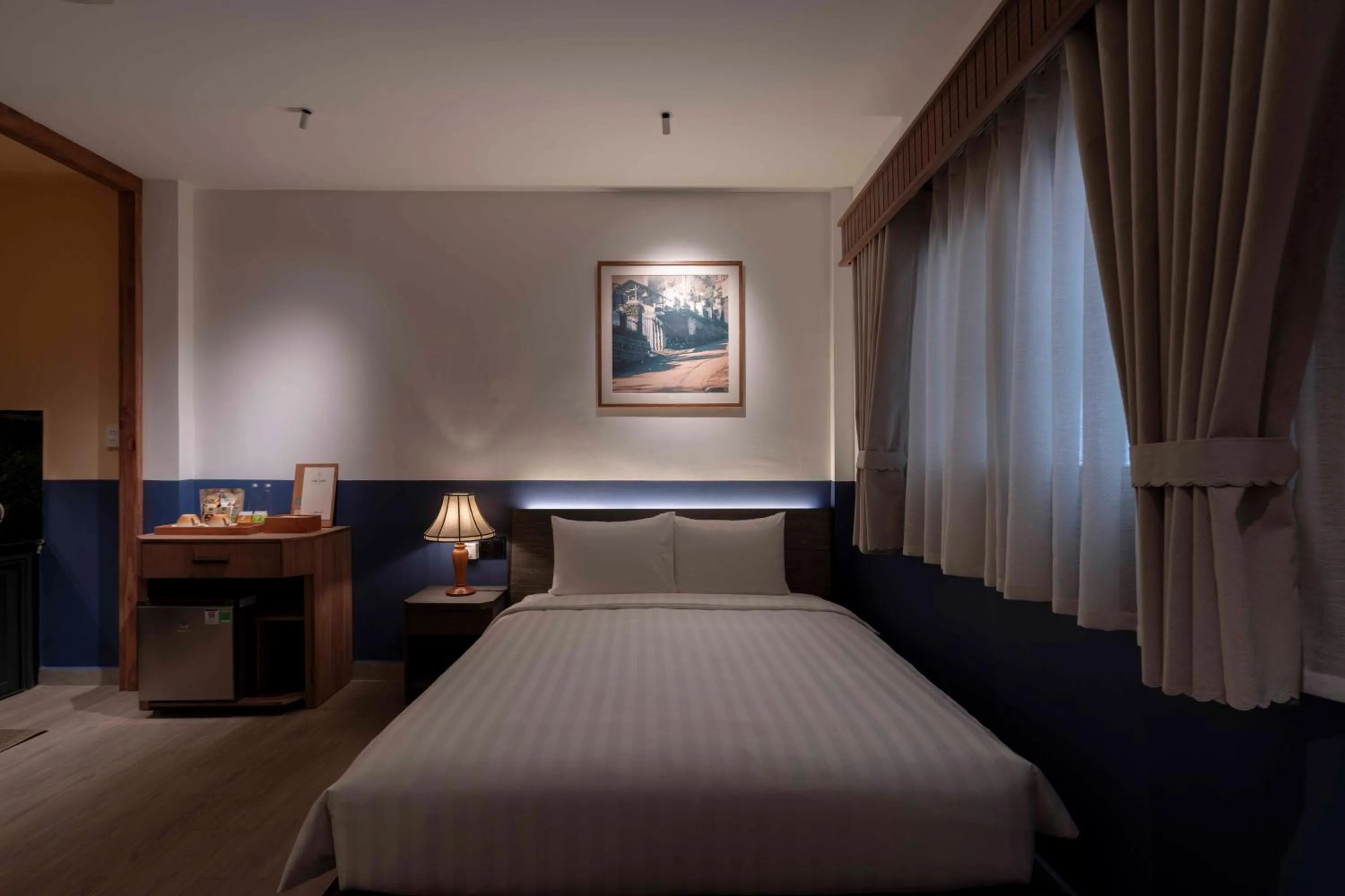 Bed in The Lamp Boutique House