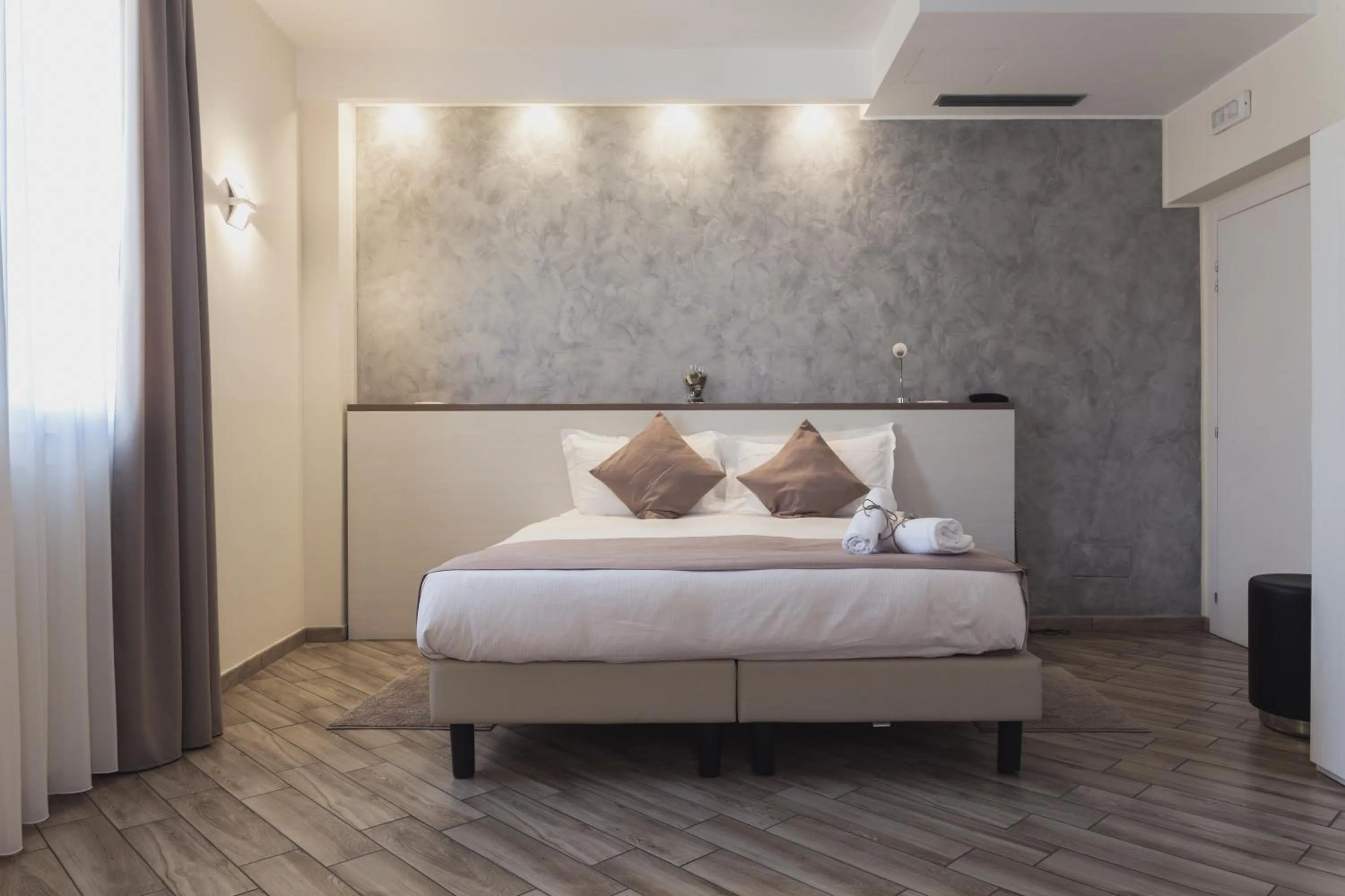 Bed in BHL Boutique Rooms Legnano