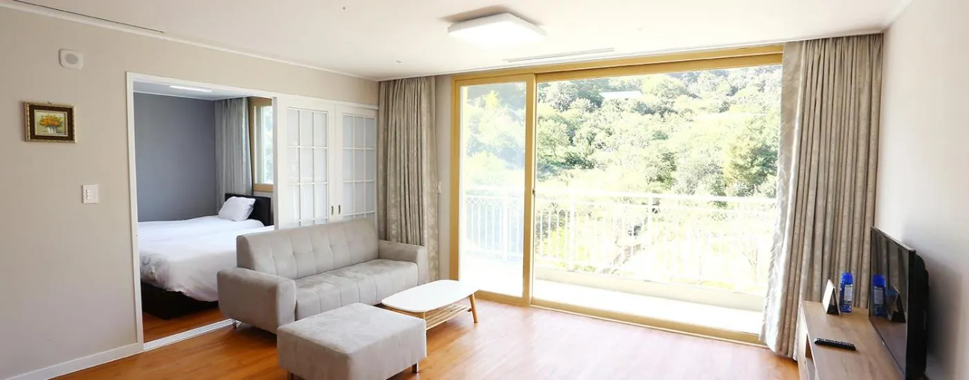 Bed in The K Jirisan Family Hotel