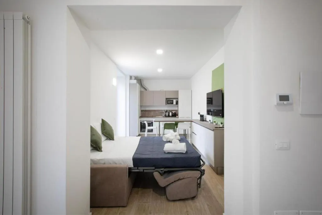 Bed in Relais Lavagnini Florence