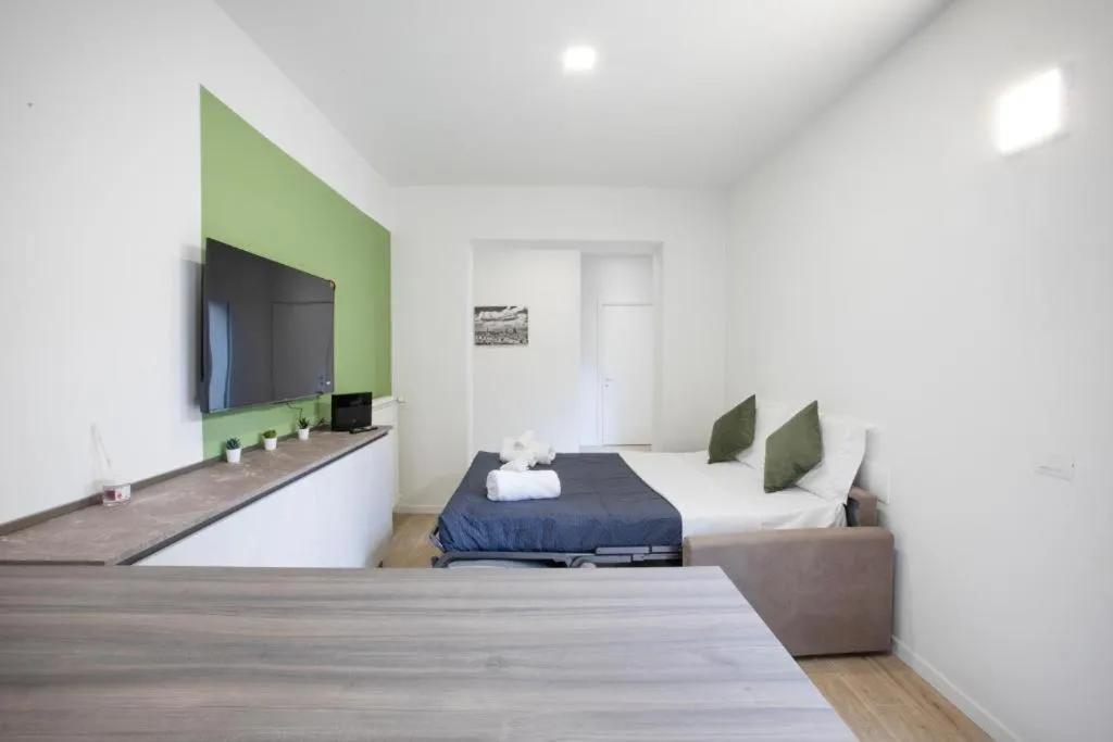 Bed in Relais Lavagnini Florence