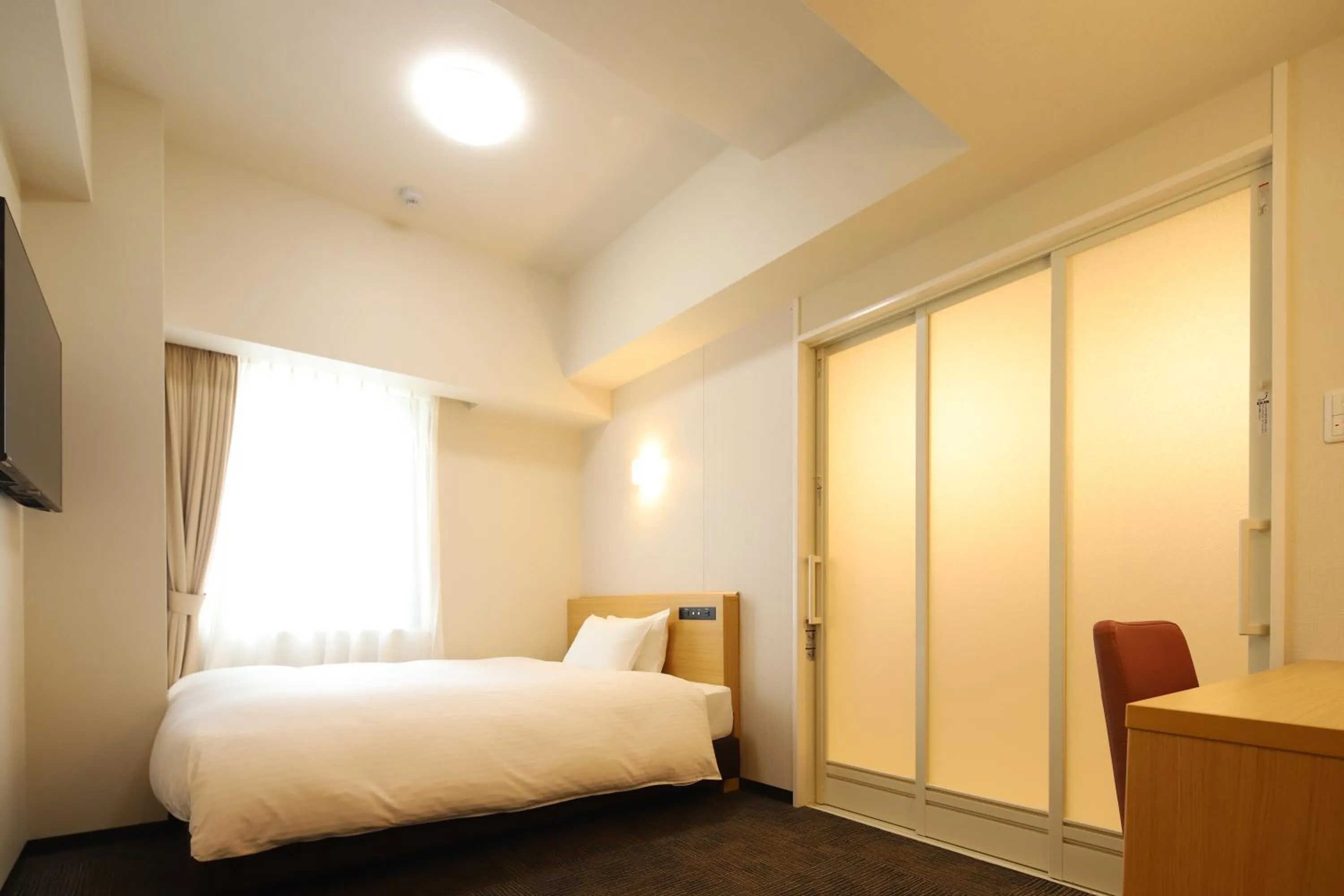 Bed in AB Hotel Anjo