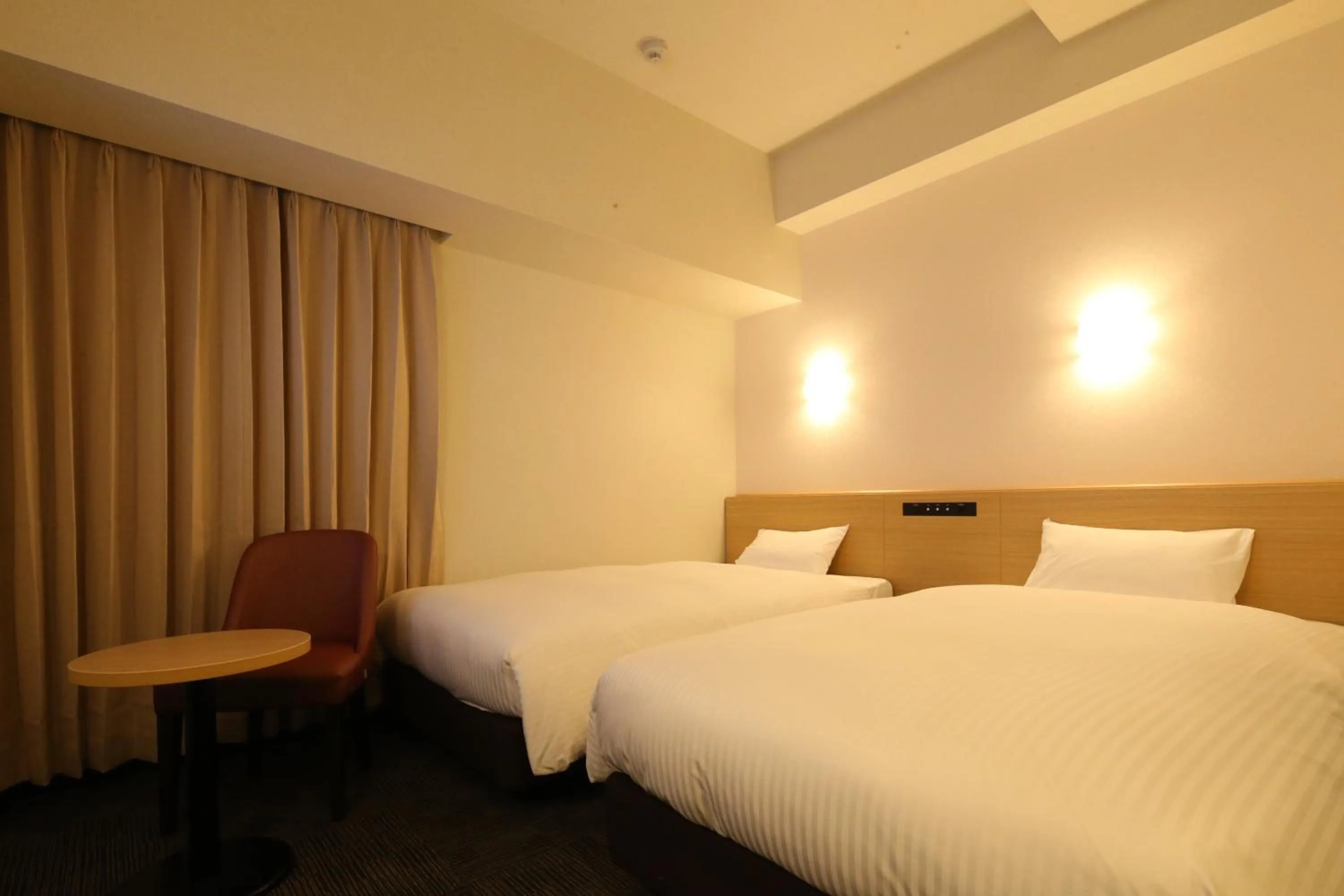 Bed in AB Hotel Anjo