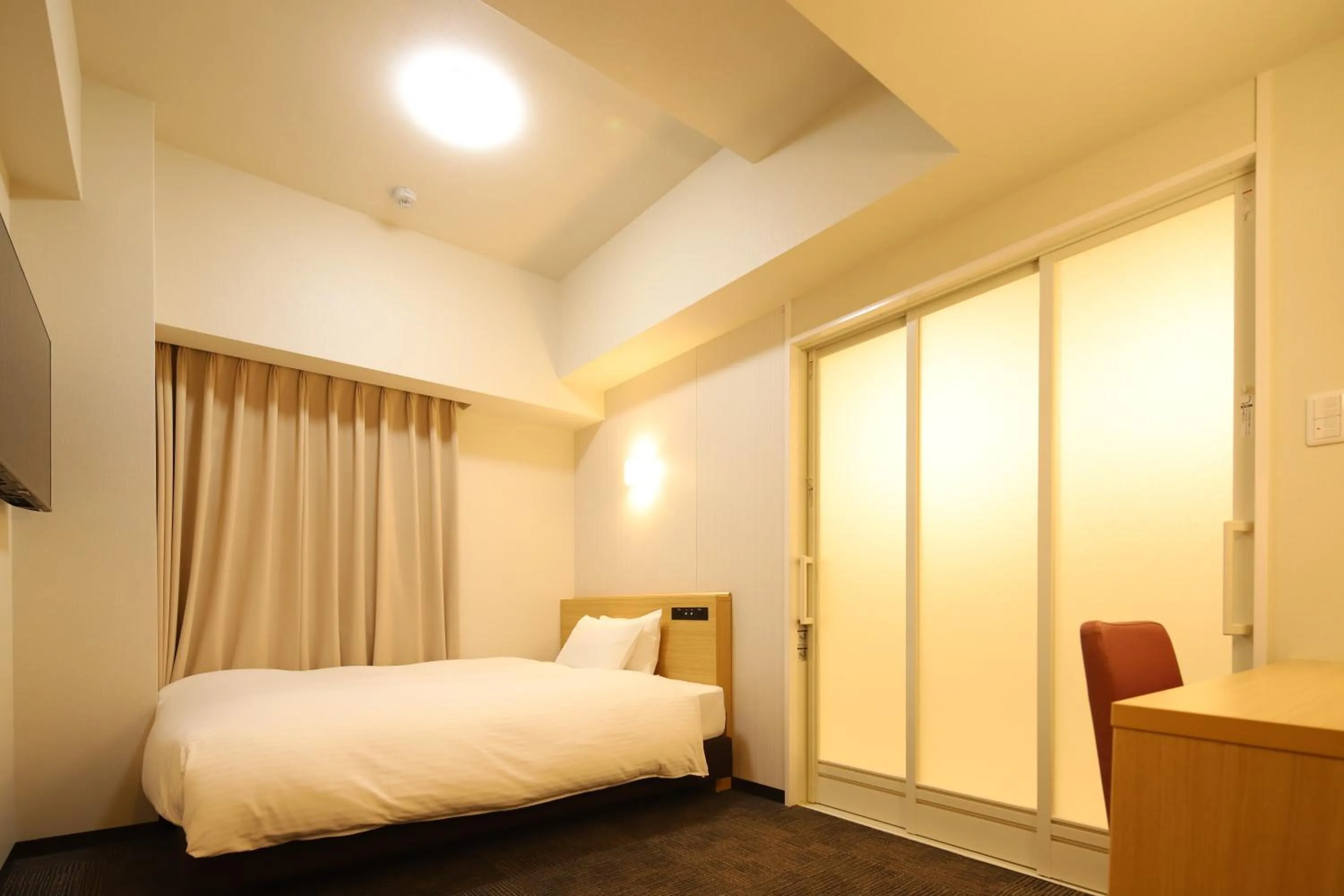 Bed in AB Hotel Anjo