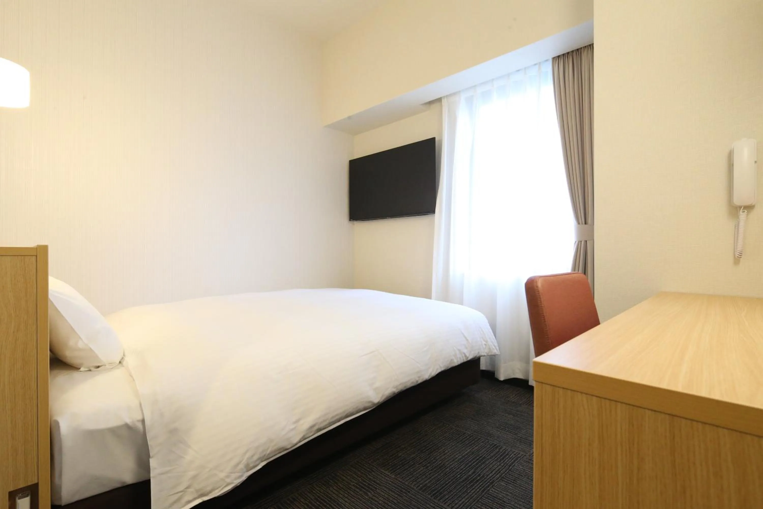 Bed in AB Hotel Anjo