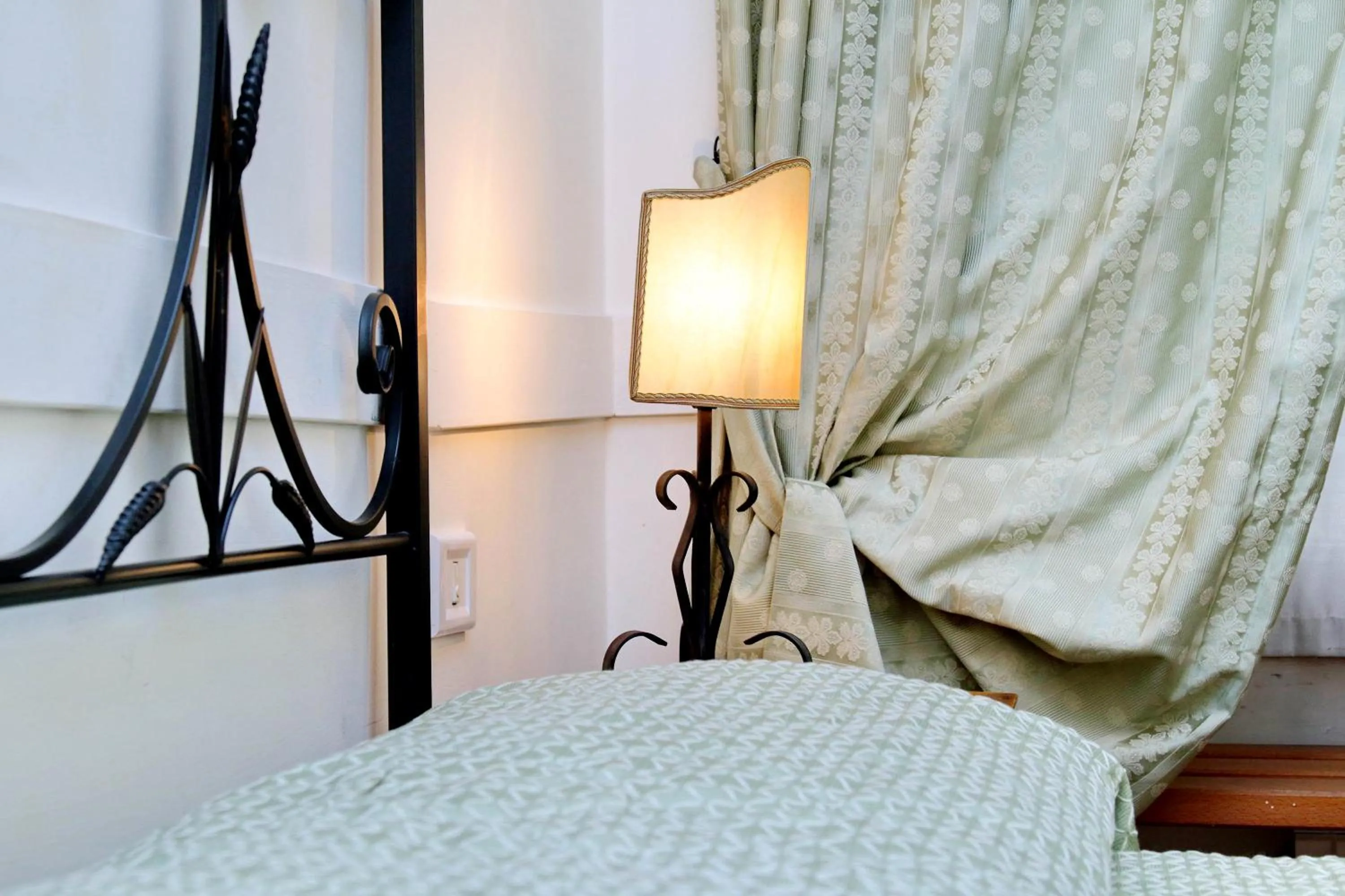 Bed in Scipioni Suites