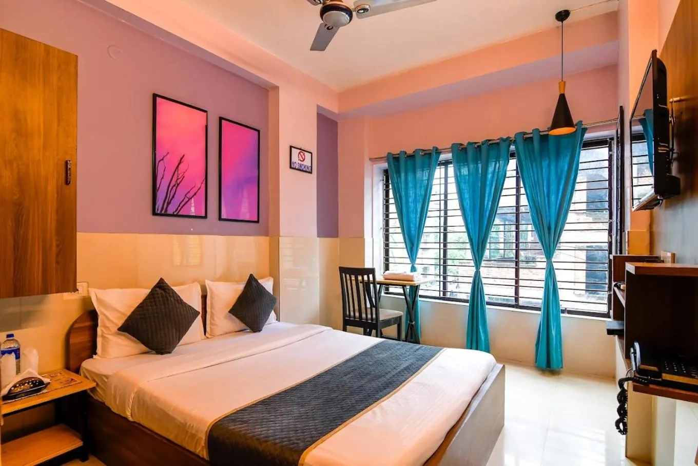 Bed in The Kolkata Hotel