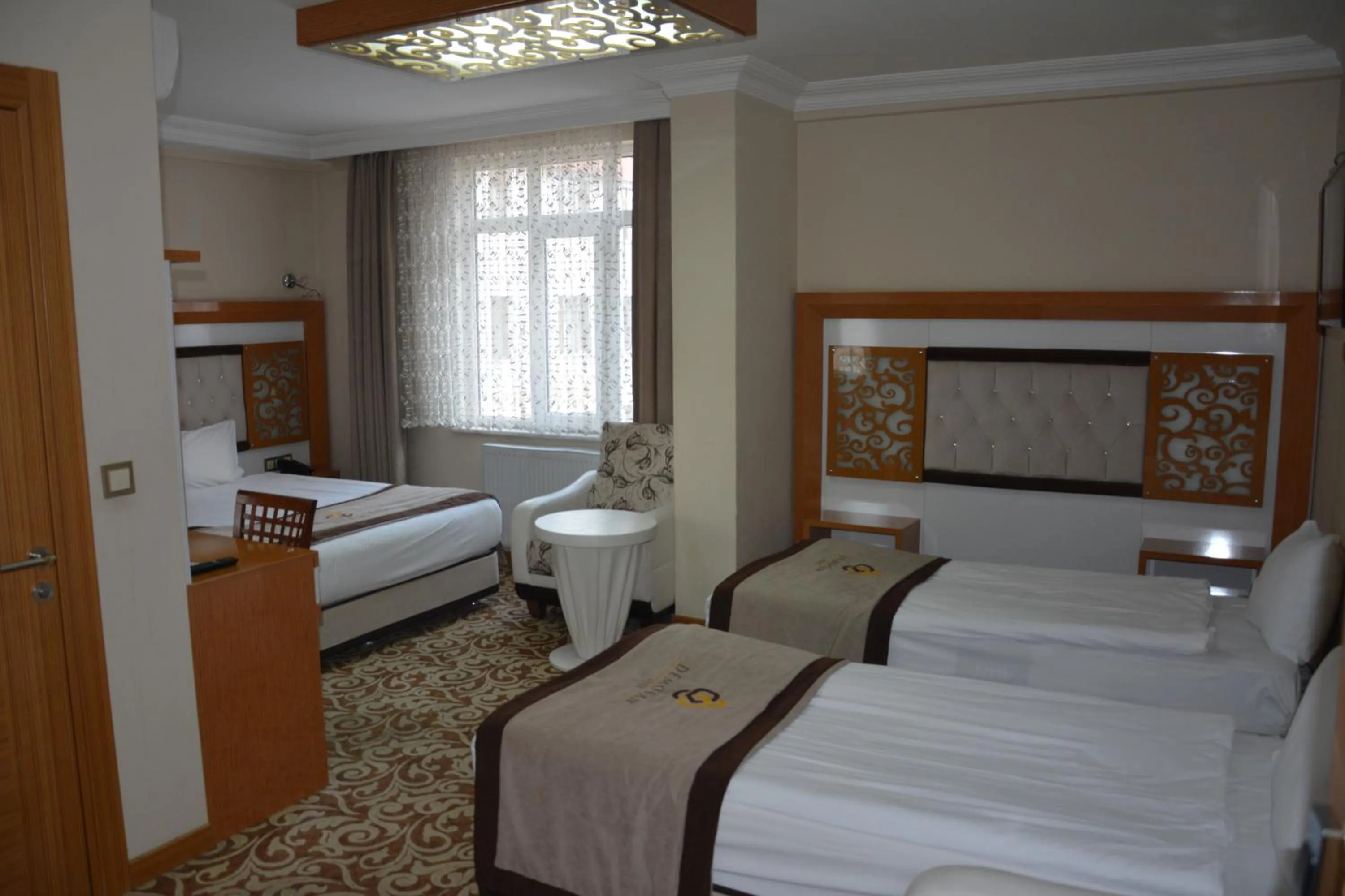 Photo of the whole room in Demosan City Hotel