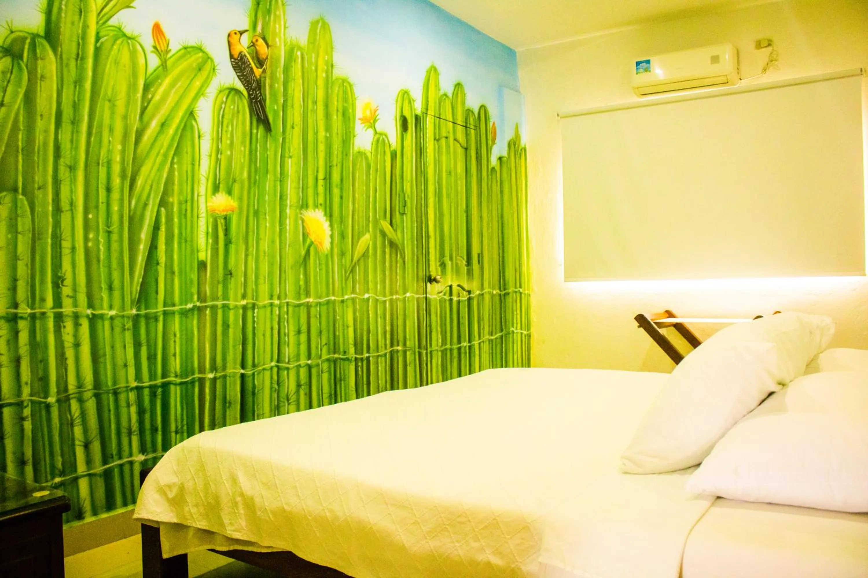 Bed in Hotel Jardines Evans By GEH Suites