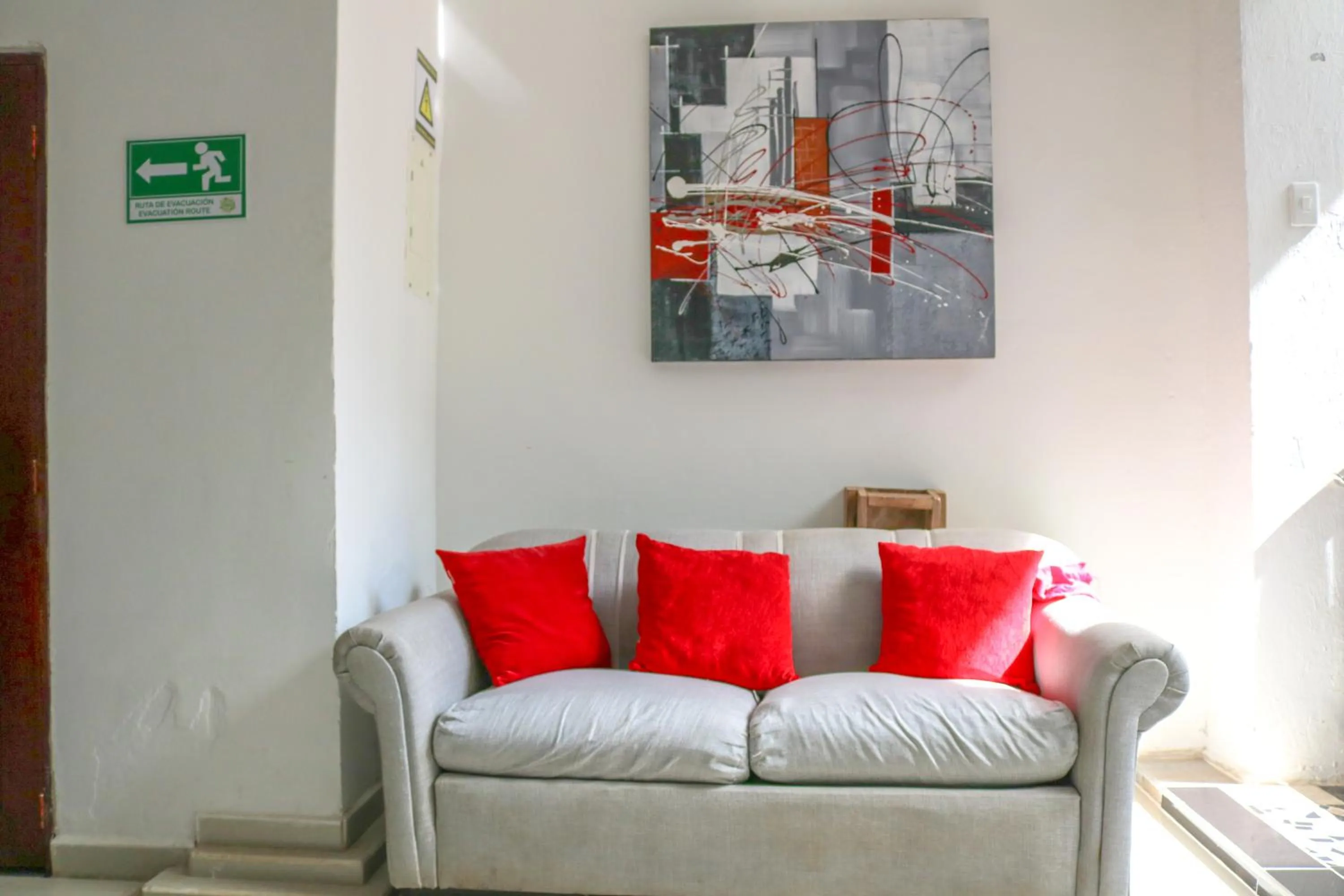 Living room in Hotel Jardines Evans By GEH Suites