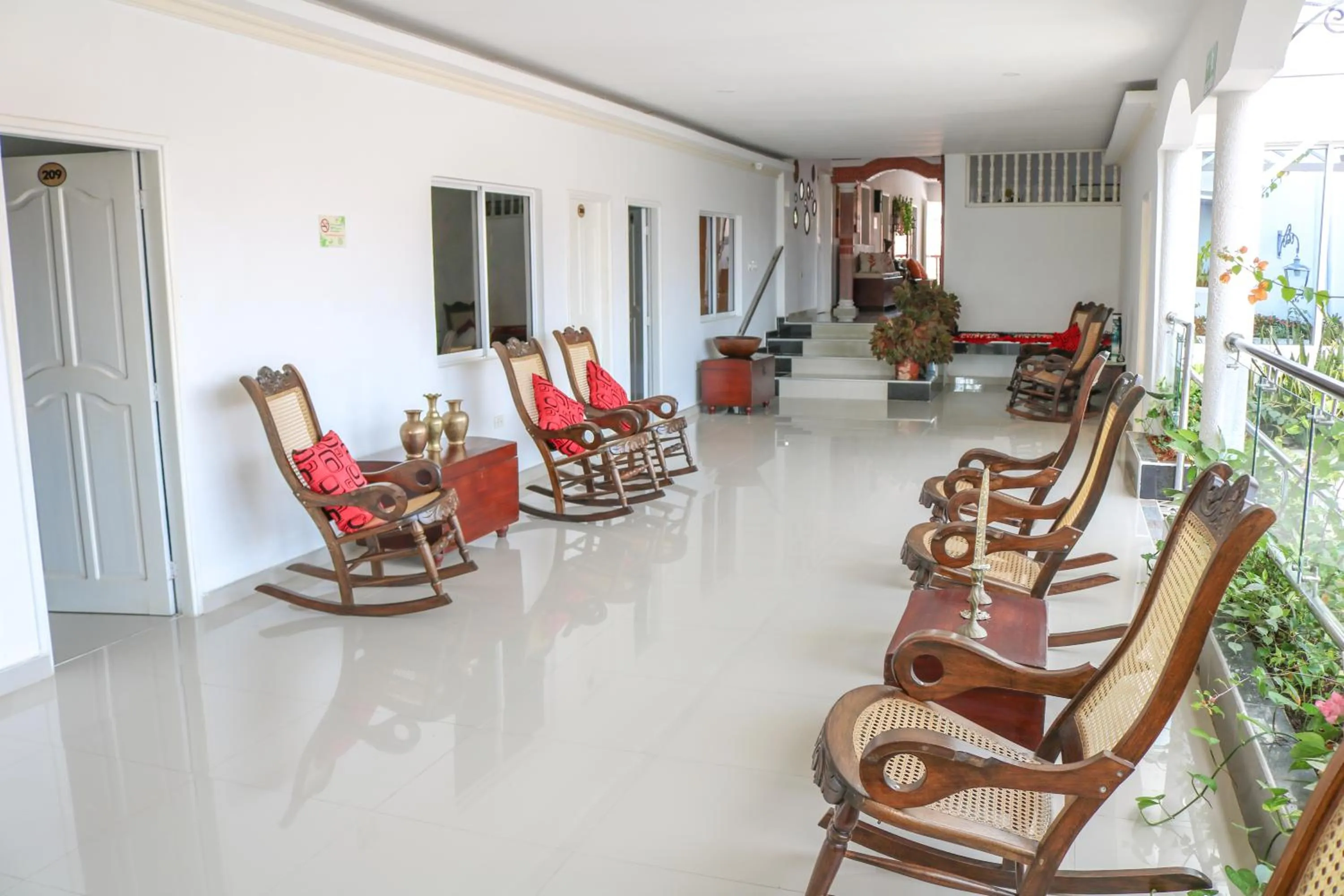 Living room in Hotel Jardines Evans By GEH Suites