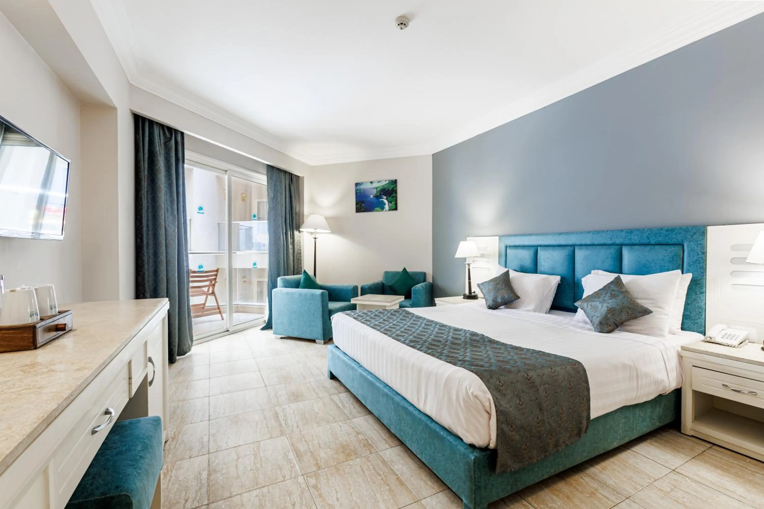 Bed in Sunrise Alora Aqua Park Resort