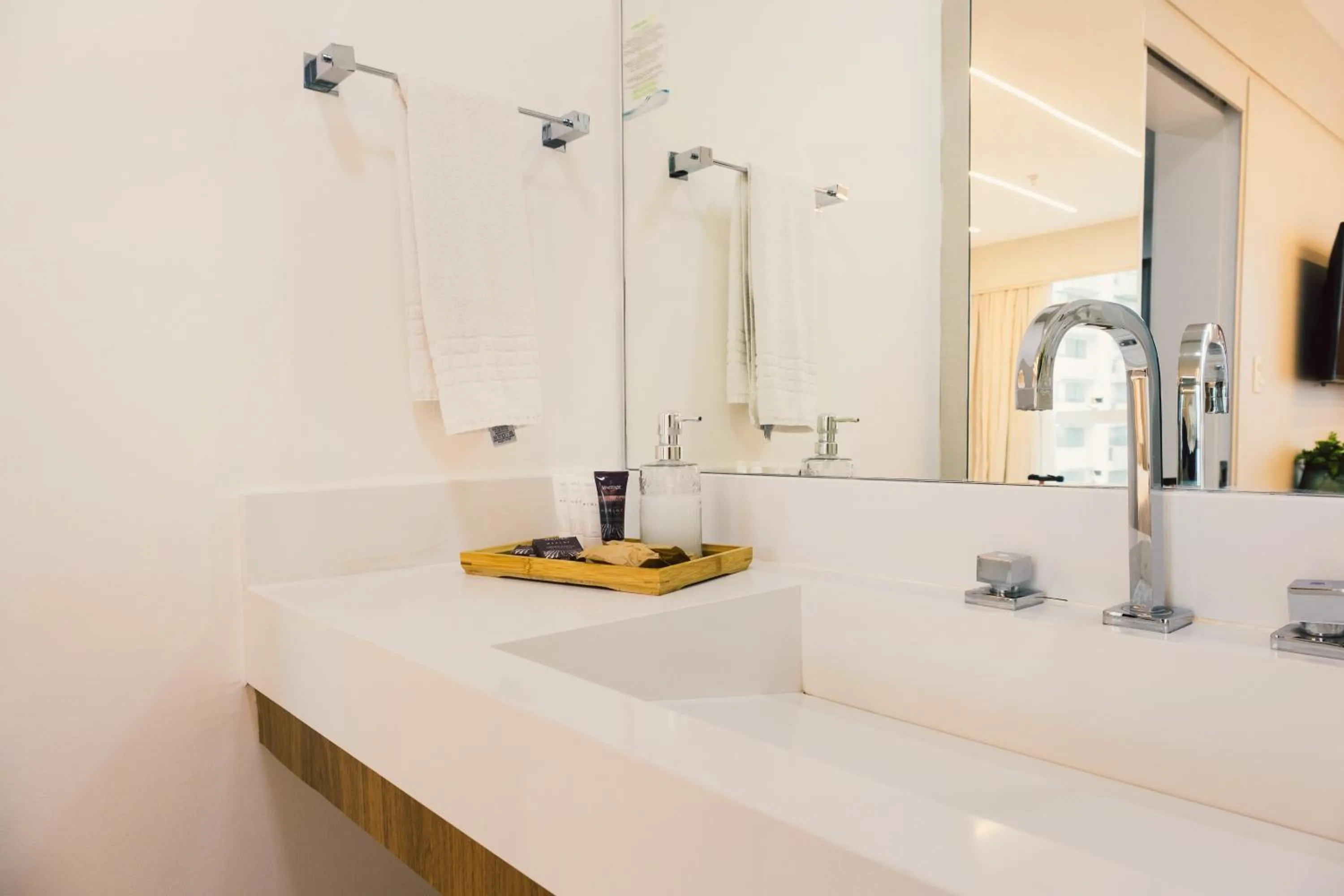 Bathroom in Ramada Hotel & Suites Campos Pelinca