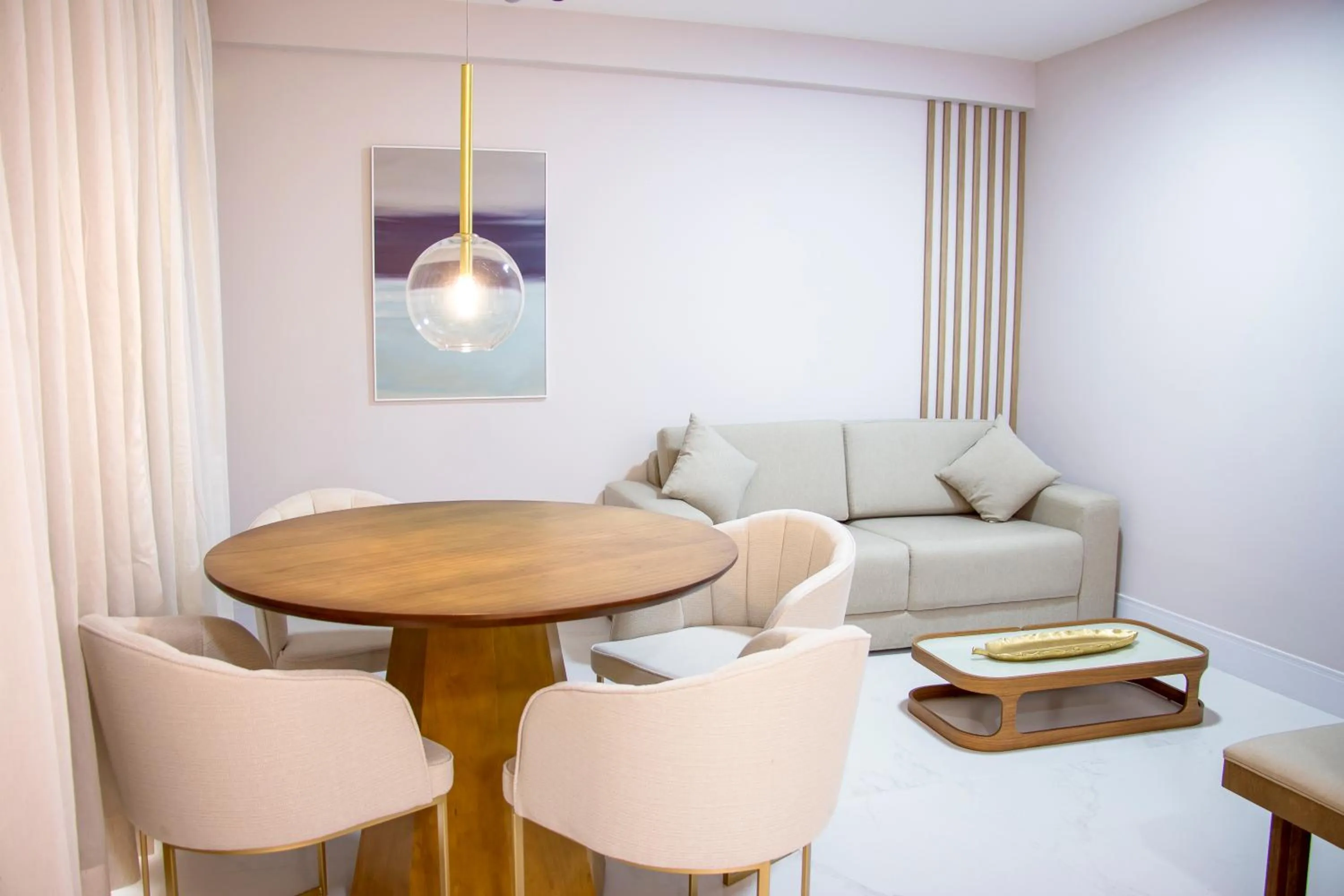 Living room in Ramada Hotel & Suites Campos Pelinca