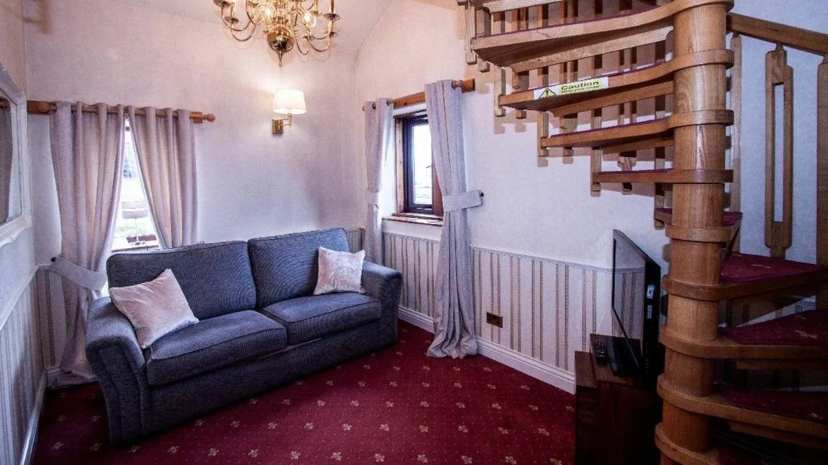 Living room in Leeming Wells