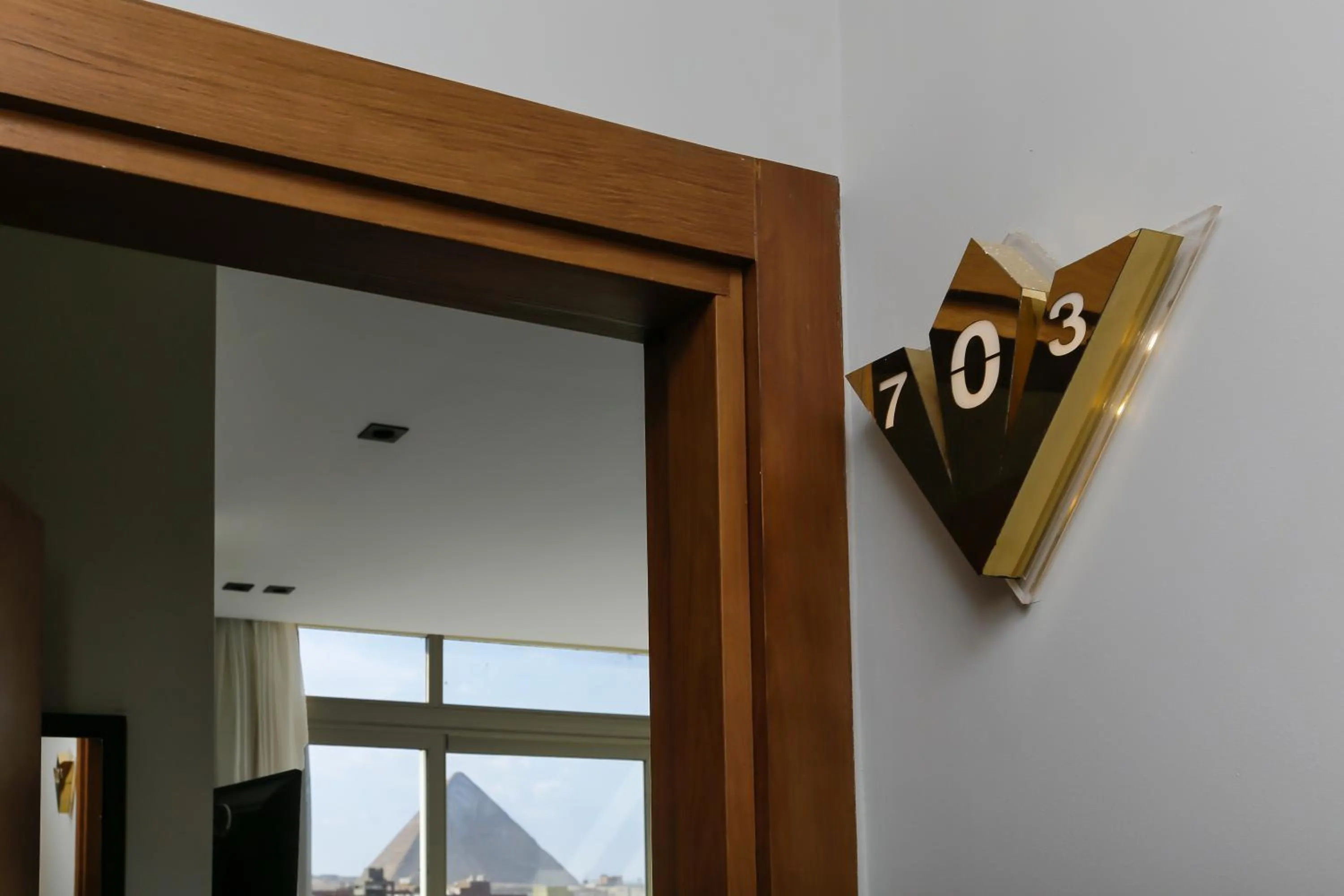 Property logo or sign in Rixoss tower Pyramids View