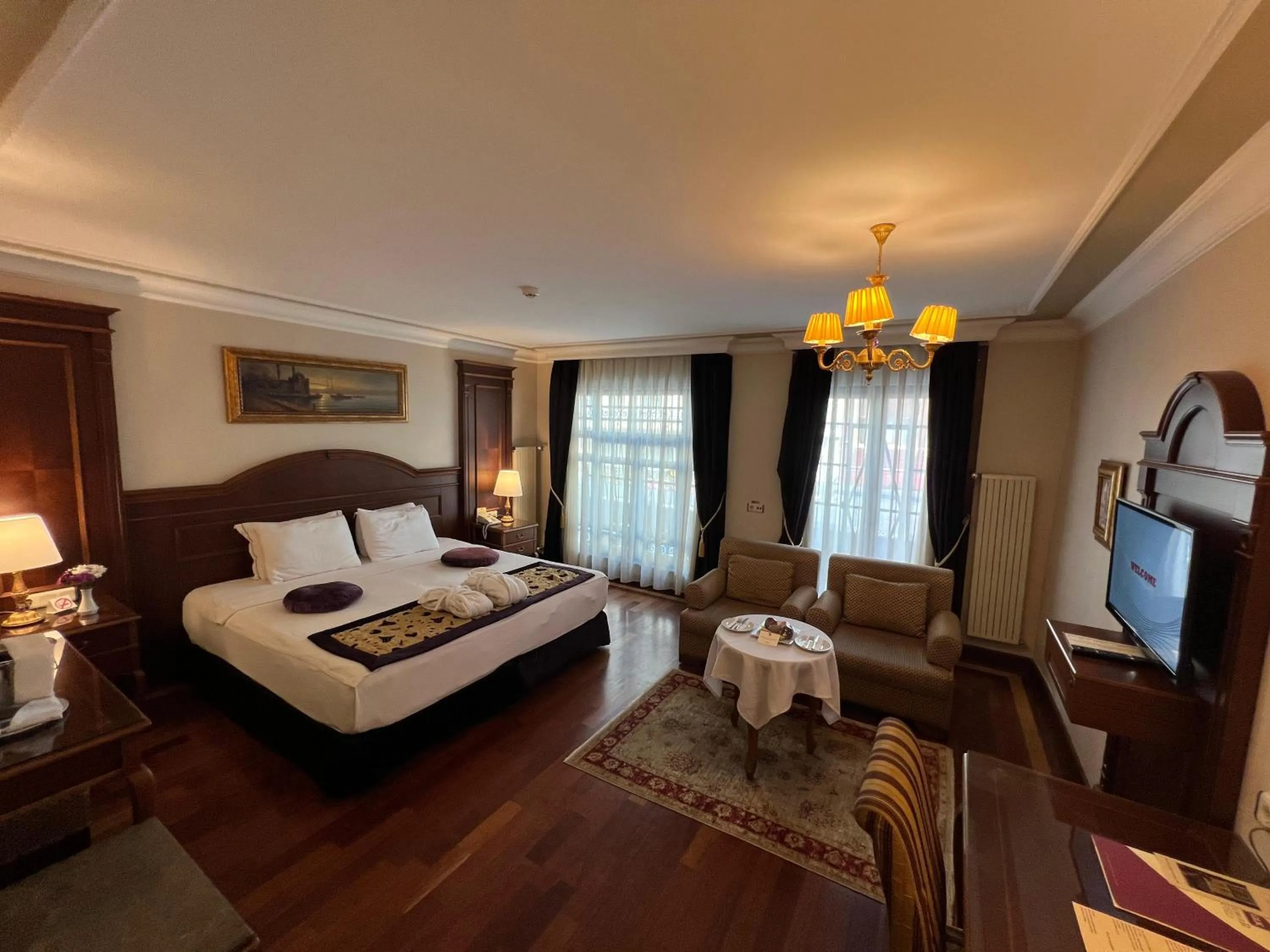 Communal lounge/ TV room, Bed in GLK PREMIER Regency Suites & Spa