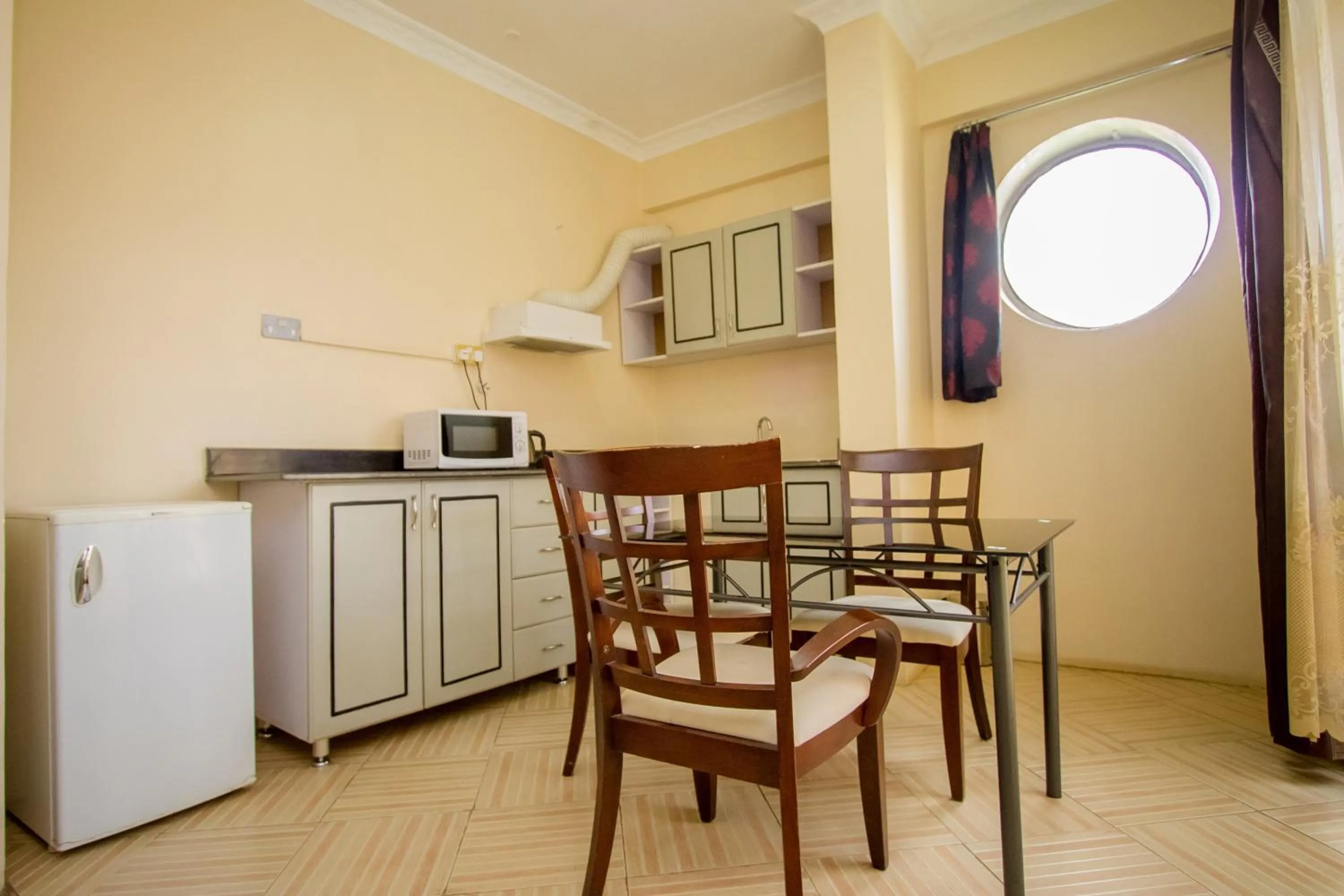 Kitchen or kitchenette in Grand Global Hotel
