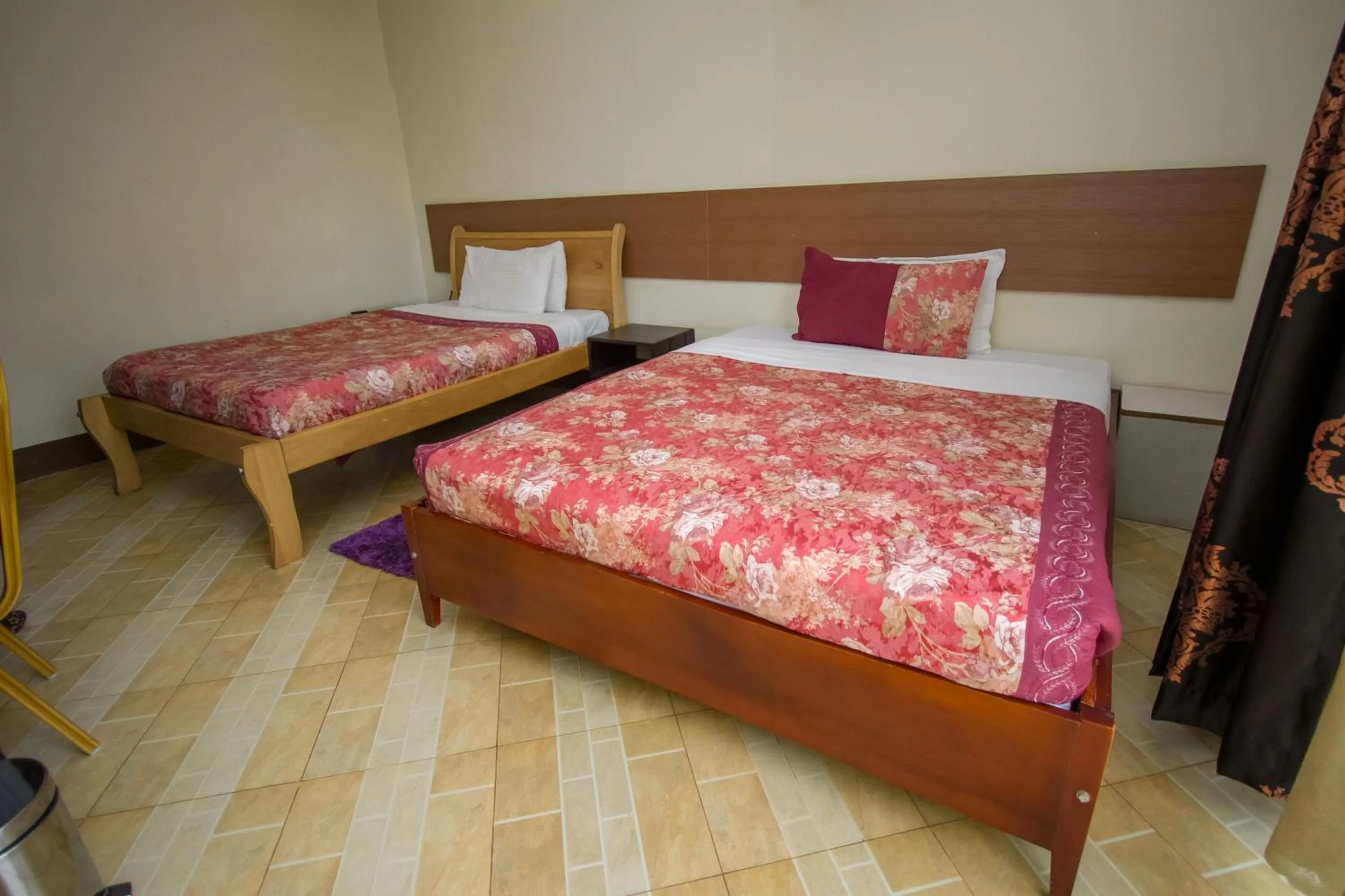 Bed in Grand Global Hotel