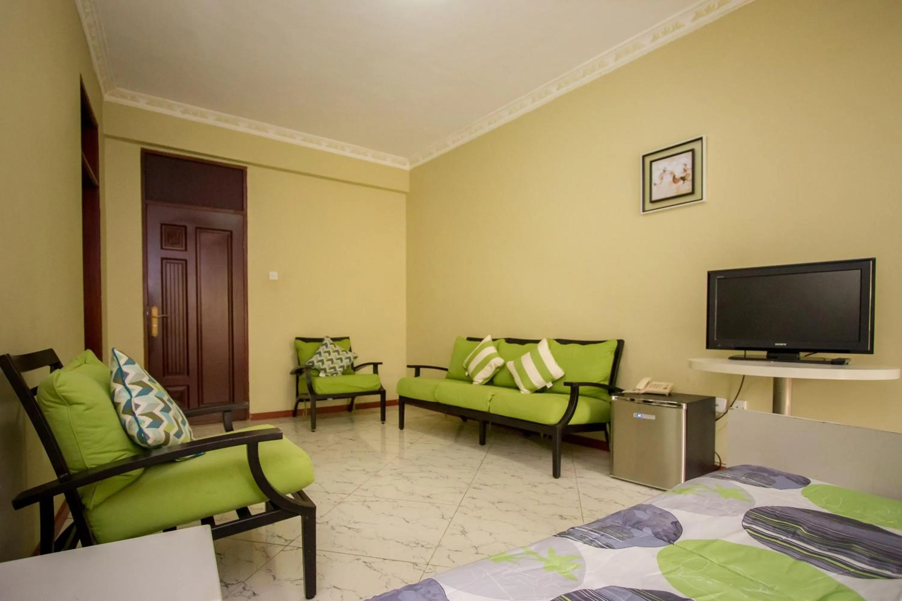 Living room in Grand Global Hotel