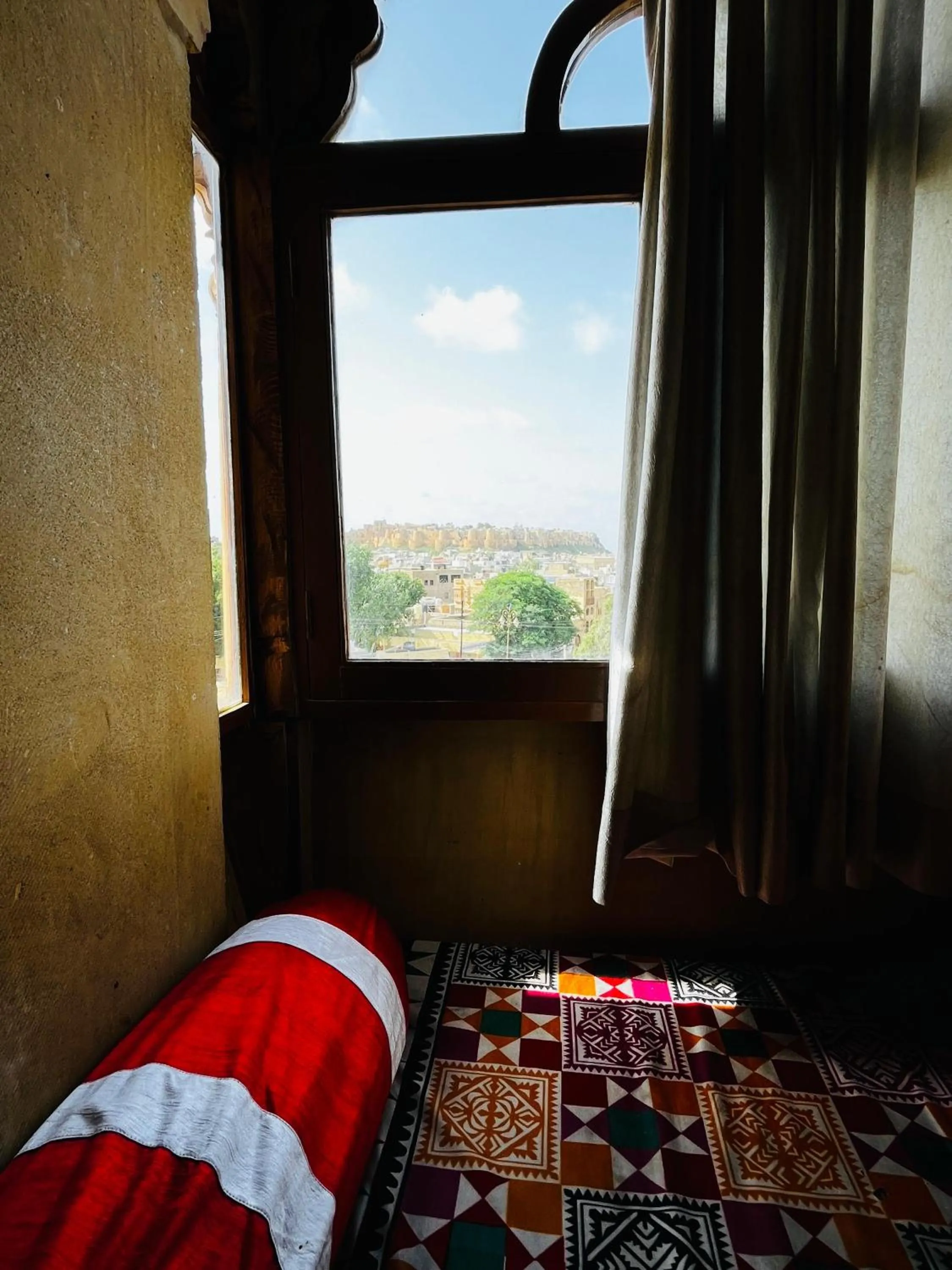 View (from property/room), Bed in Golden Marigold Hotel