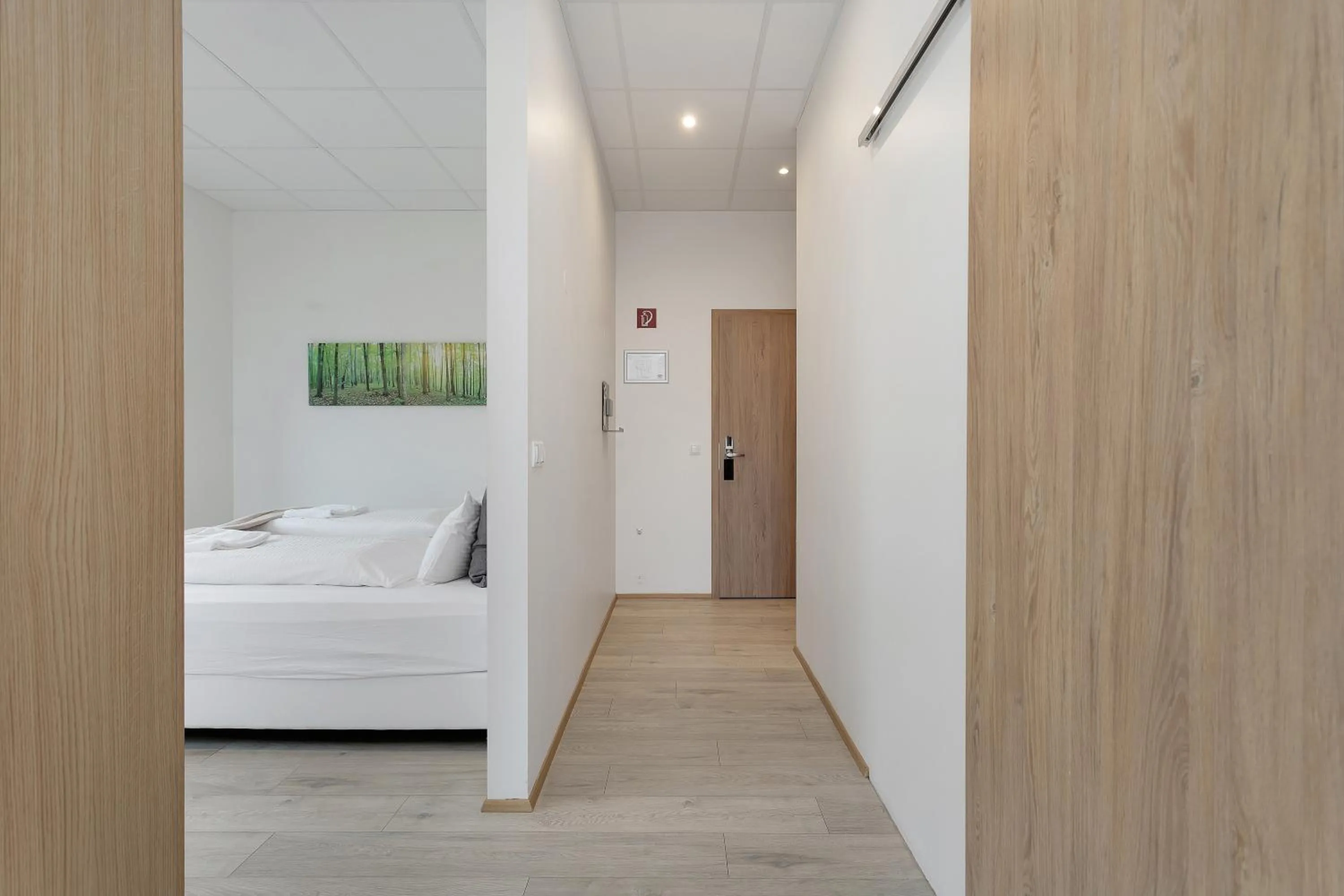 Bed in Blue Mountain Apartments by Heimaleiga