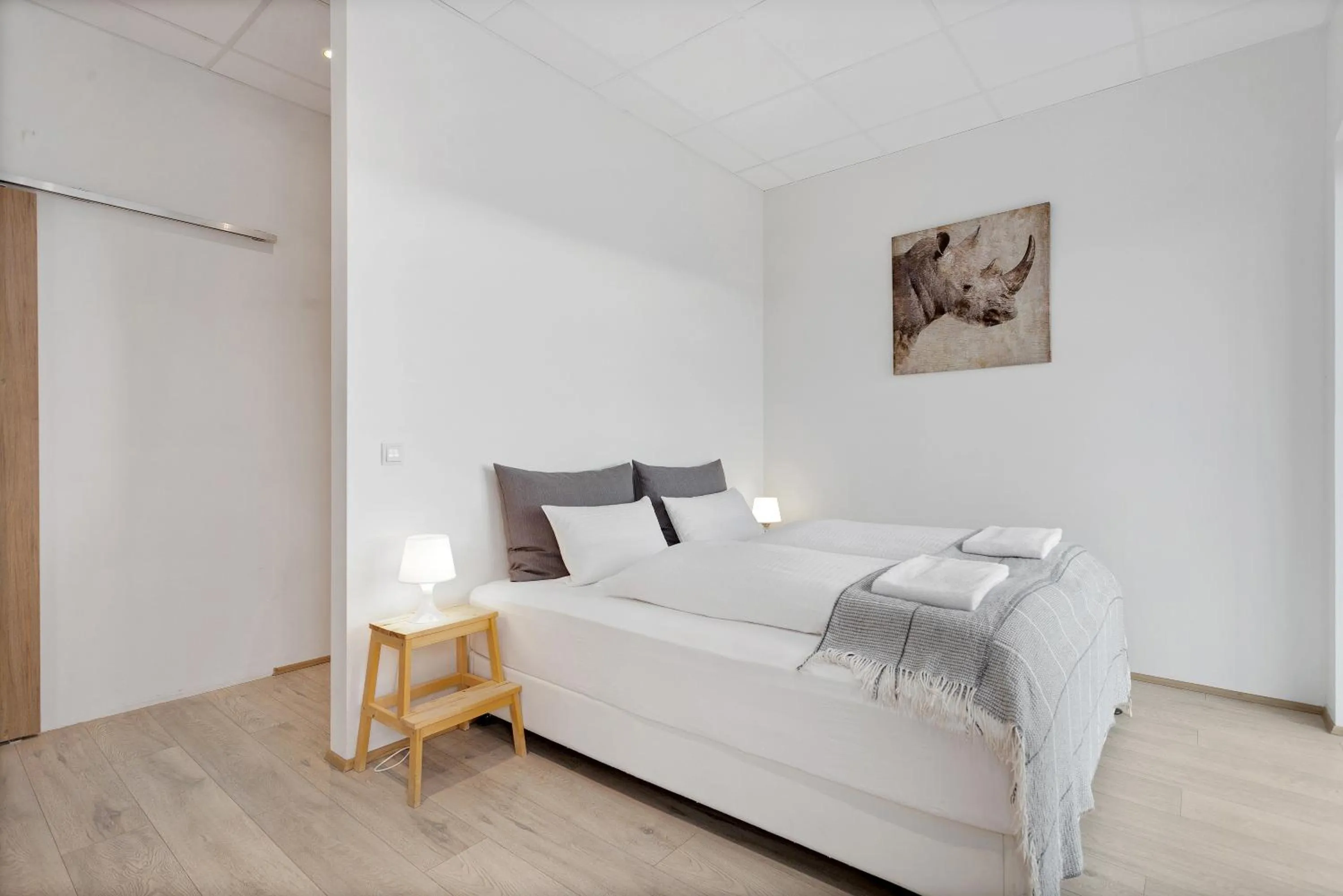 Bed in Blue Mountain Apartments by Heimaleiga