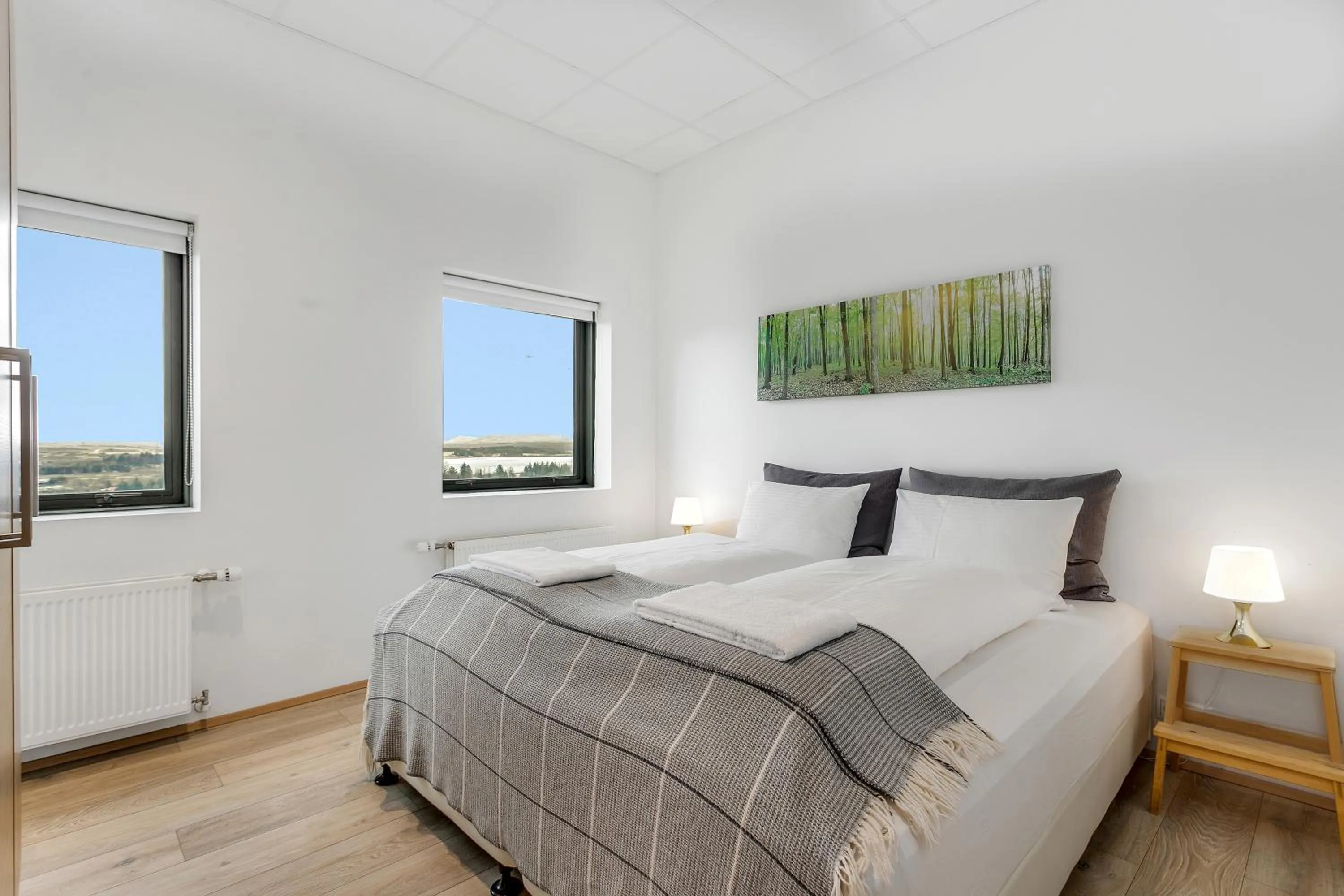 Bed in Blue Mountain Apartments by Heimaleiga