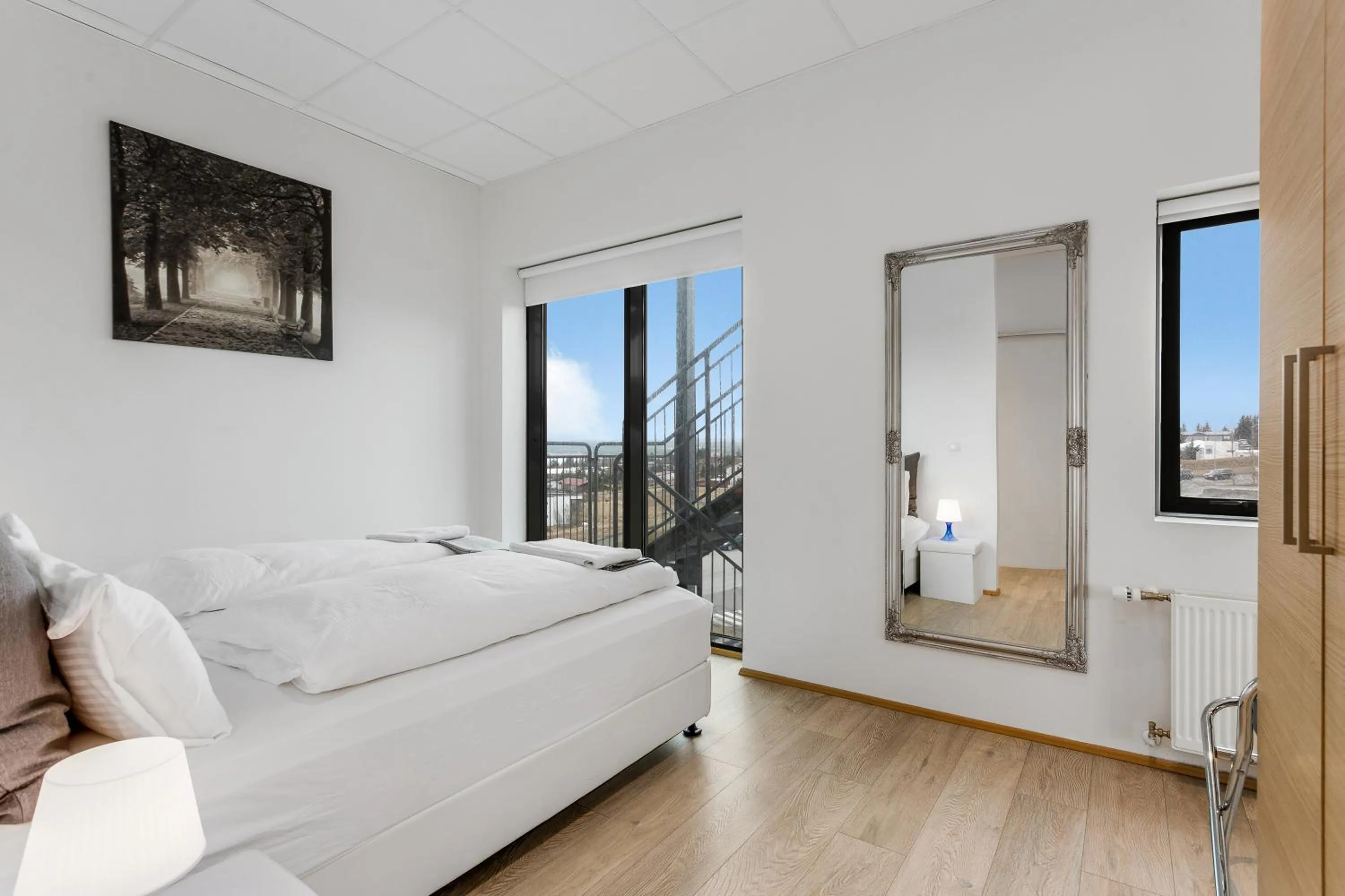 Bed in Blue Mountain Apartments by Heimaleiga