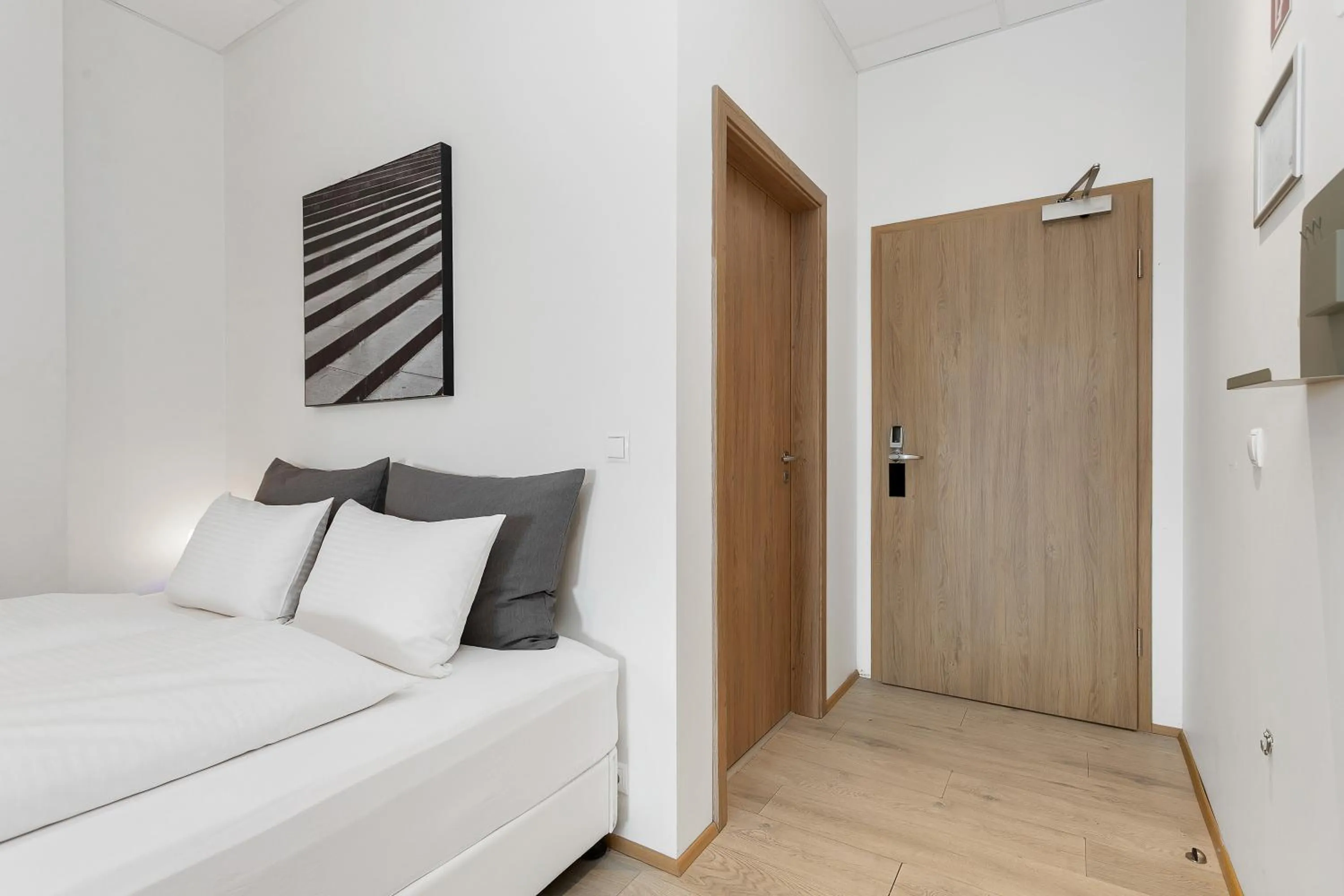 Bed in Blue Mountain Apartments by Heimaleiga