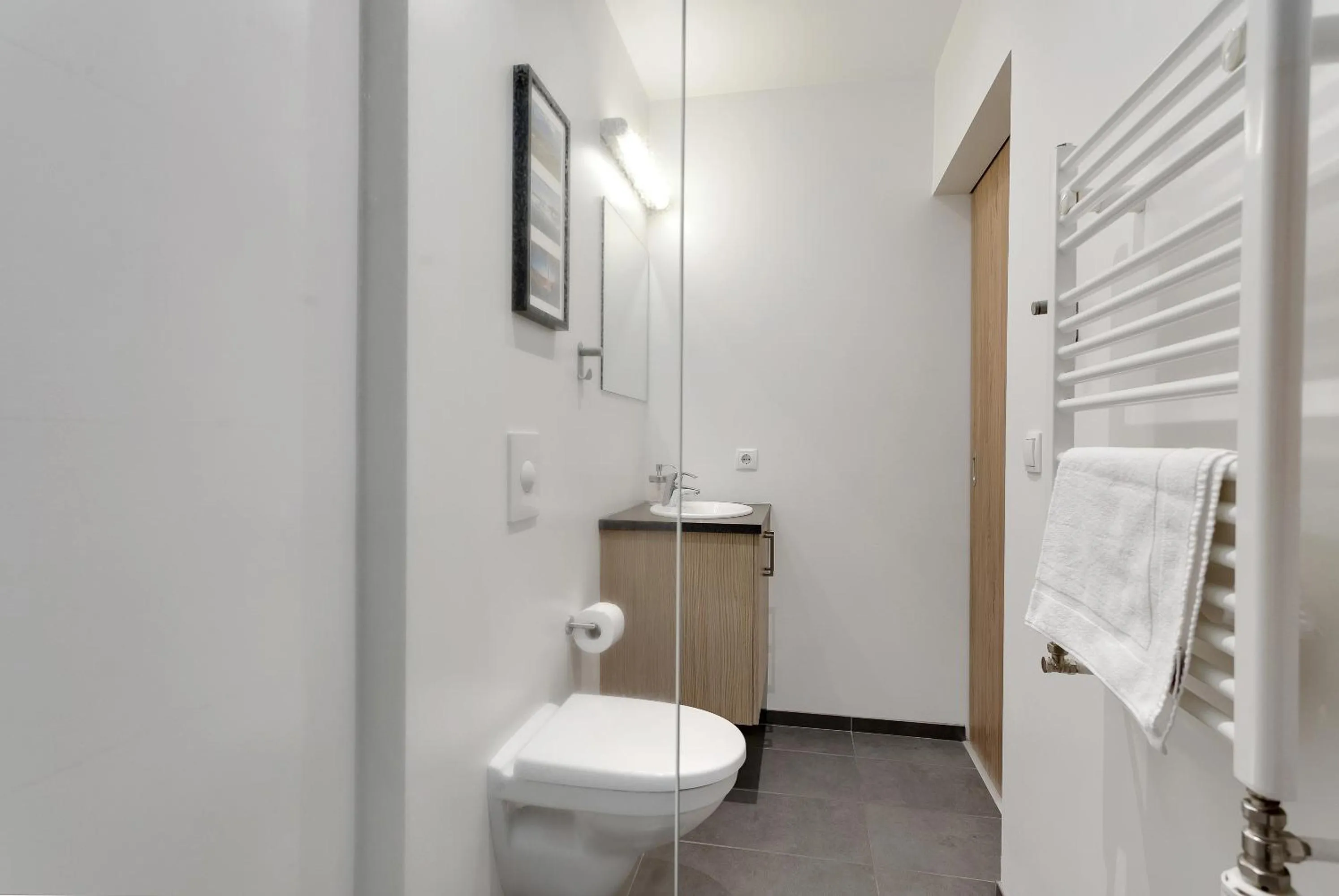 Toilet in Blue Mountain Apartments by Heimaleiga