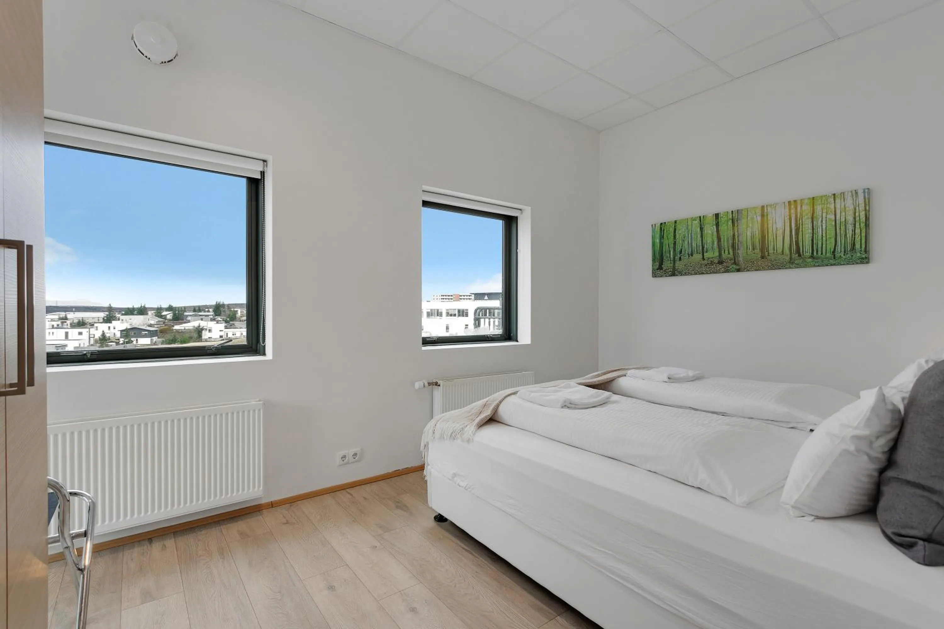 Bed in Blue Mountain Apartments by Heimaleiga