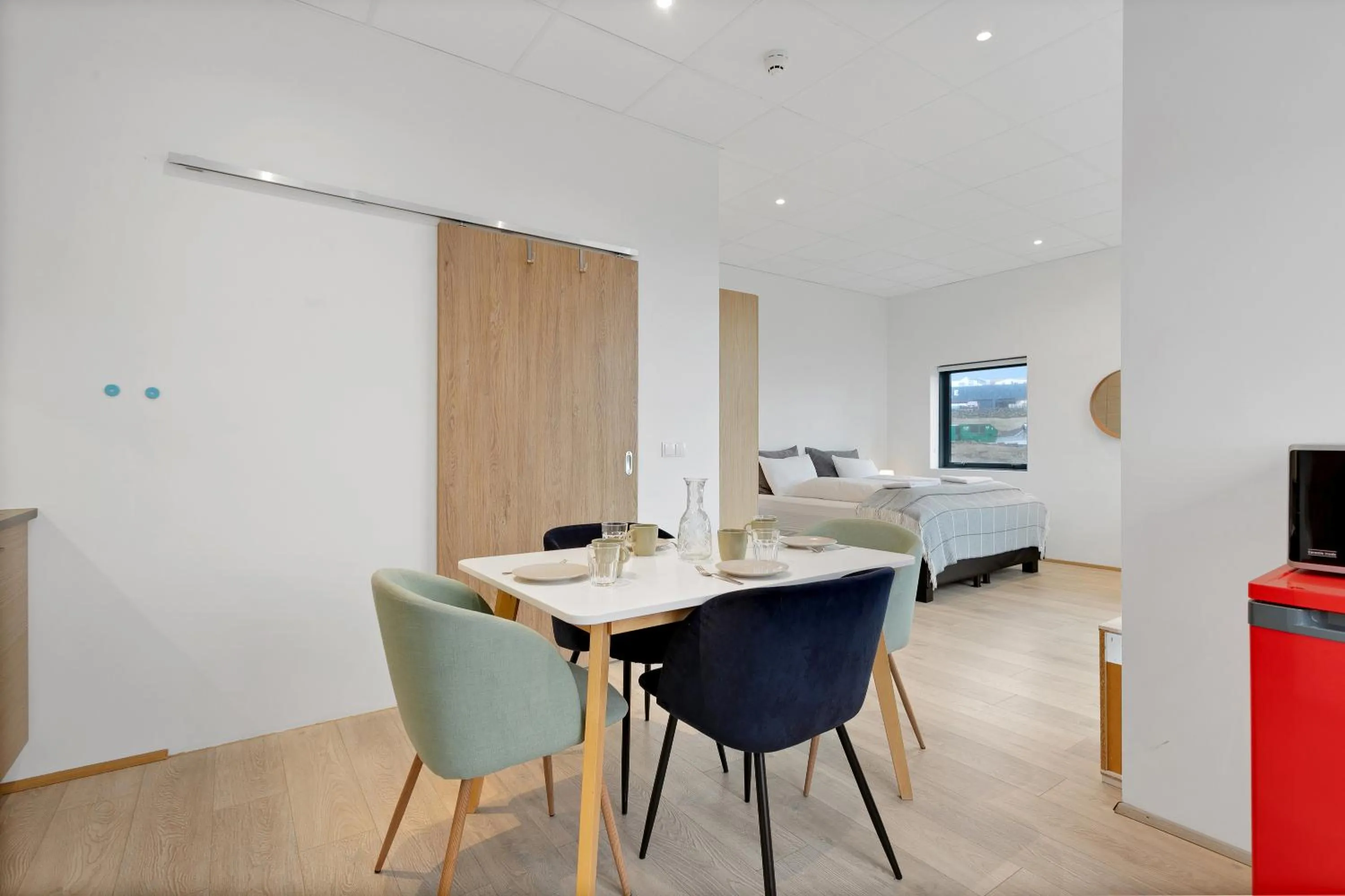 Bed in Blue Mountain Apartments by Heimaleiga