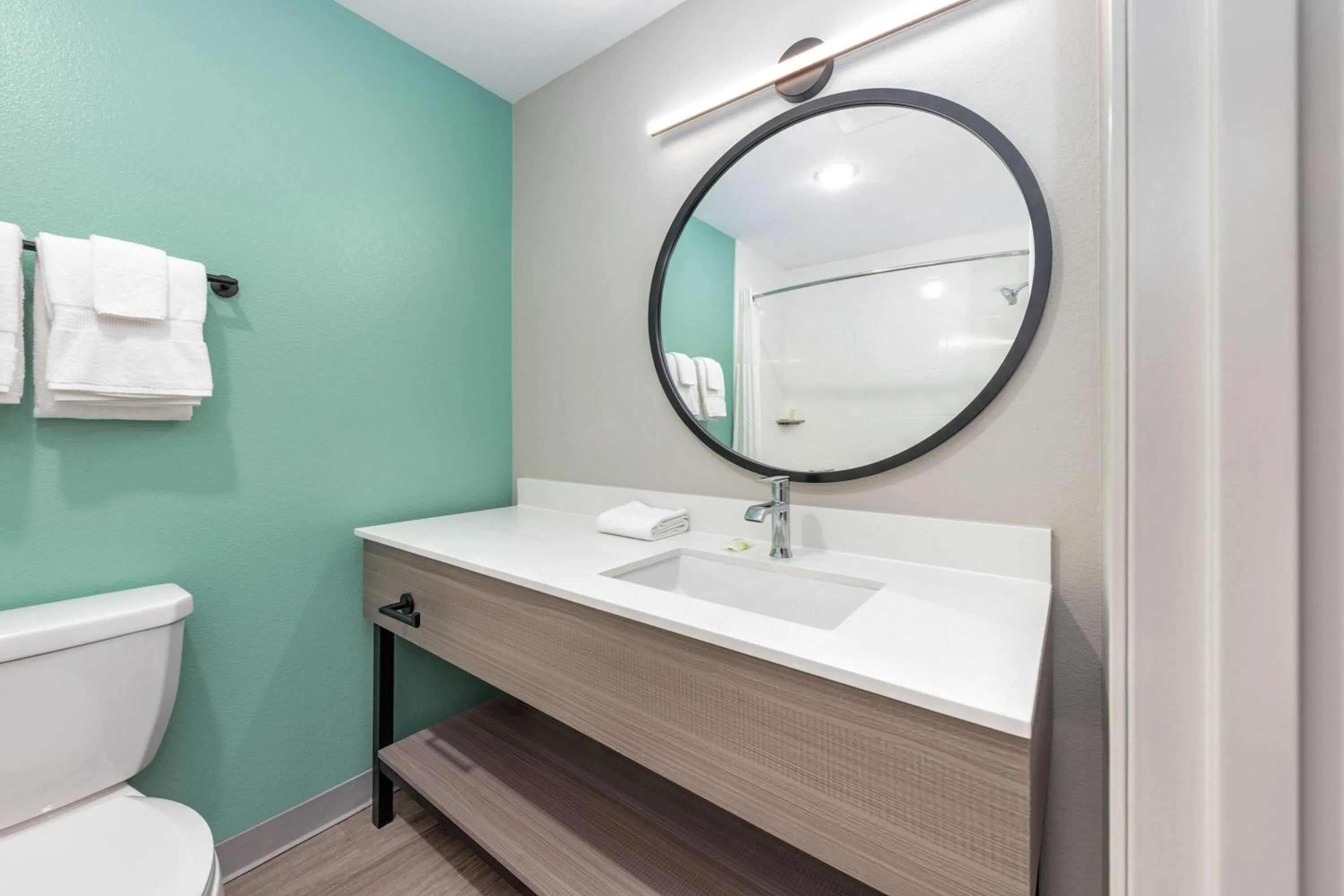 Bathroom in ECHO Suites Extended Stay by Wyndham Dallas Plano Richardson