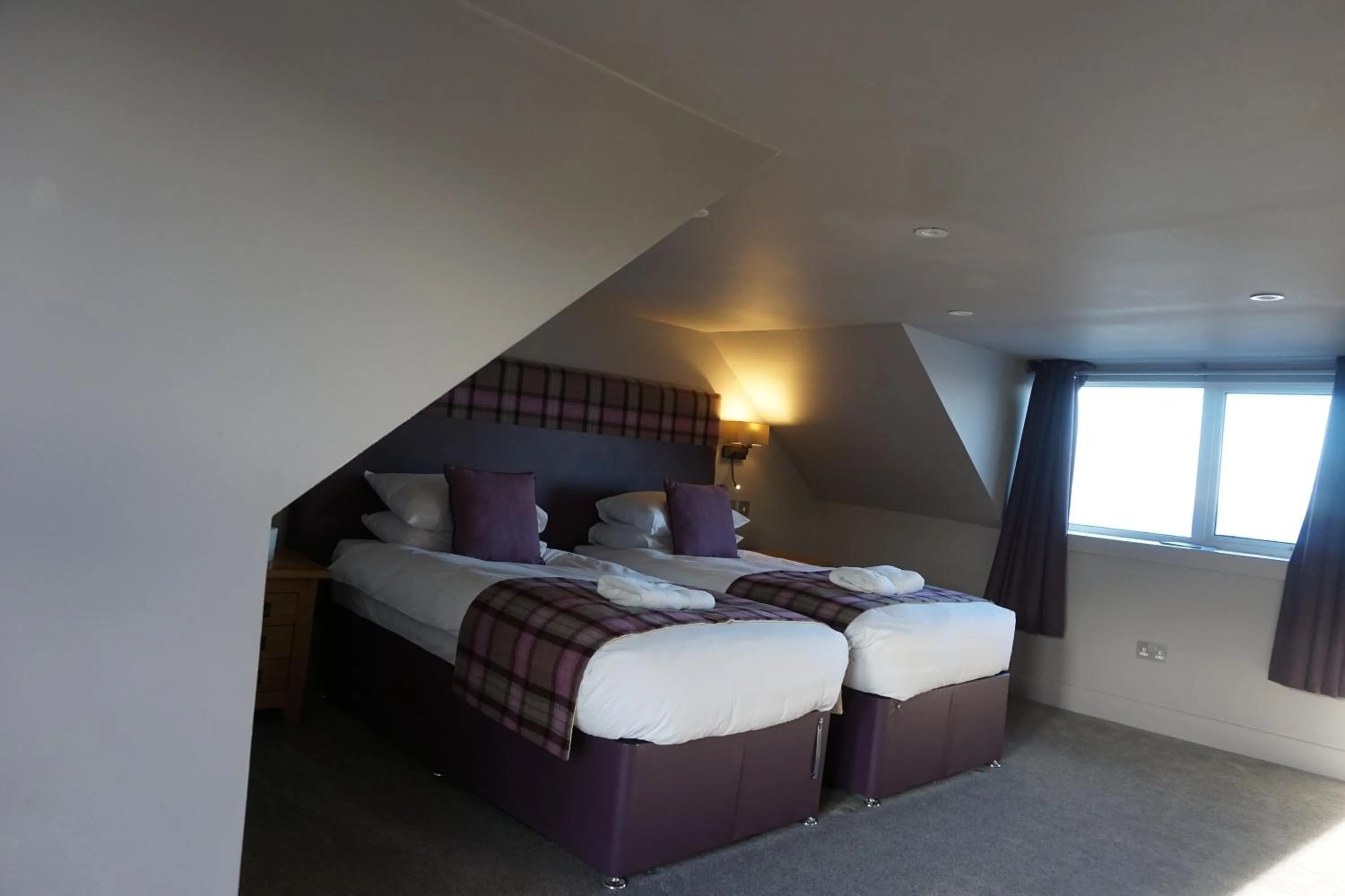 Bed in Lochside Hotel