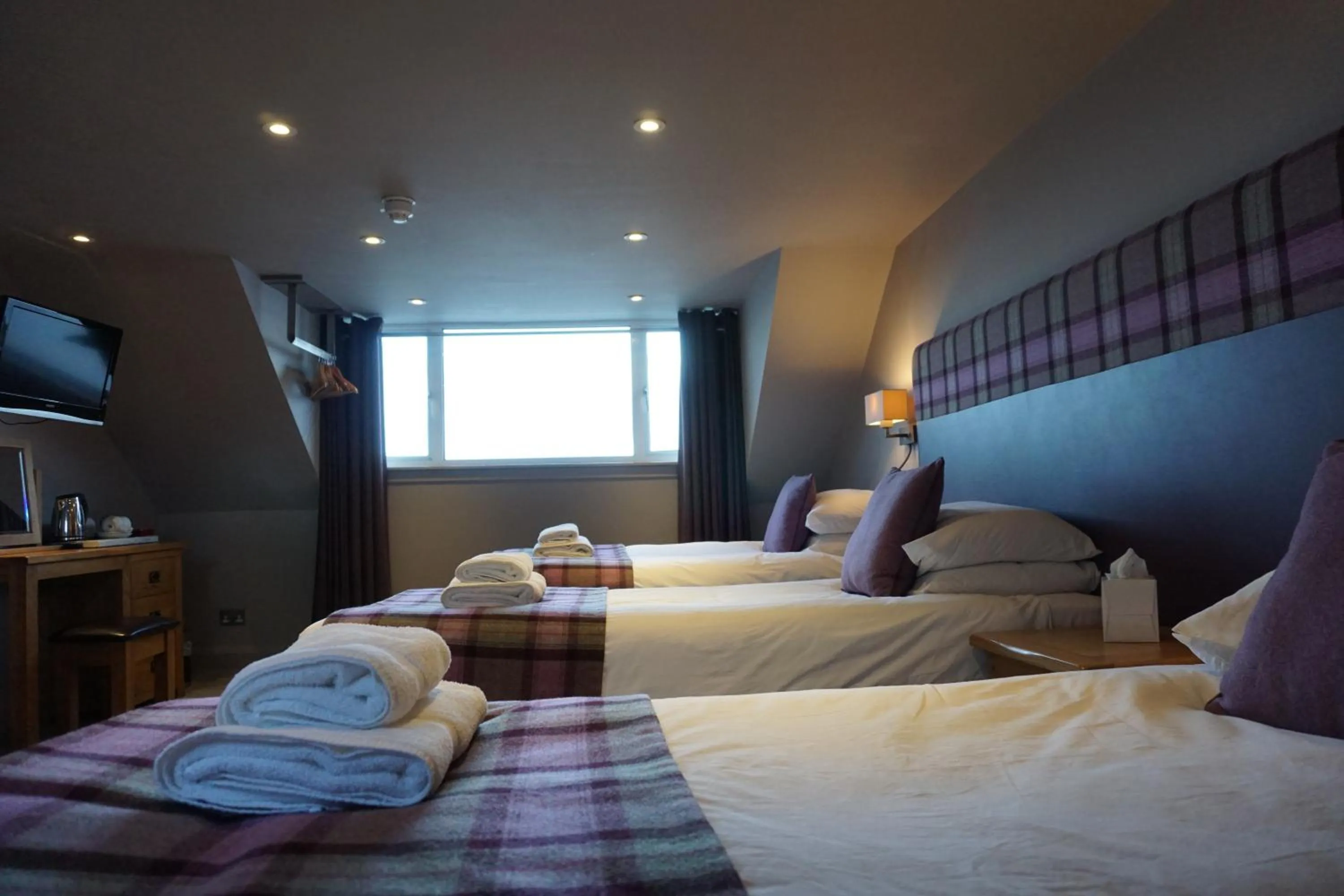 Bed in Lochside Hotel