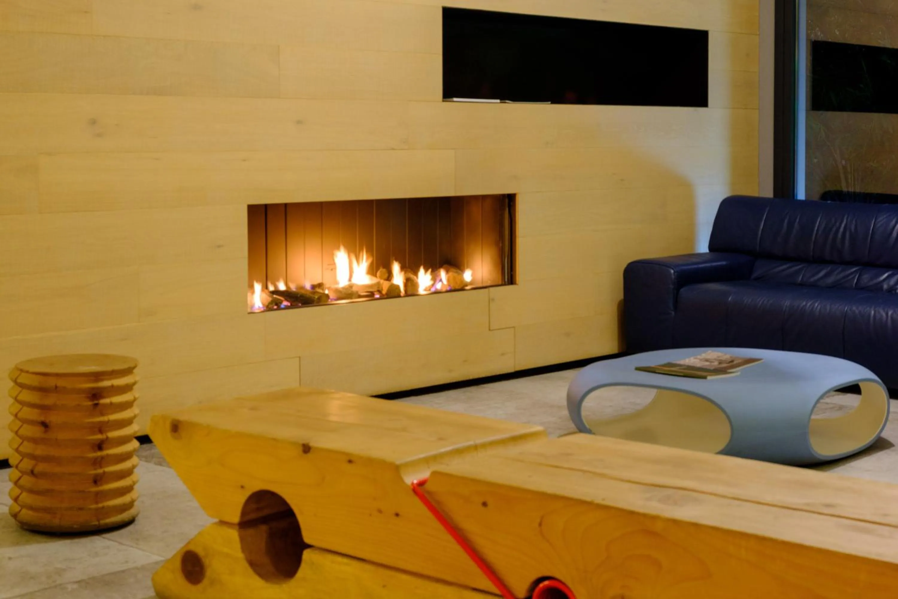 Communal lounge/ TV room in Essence Hotel