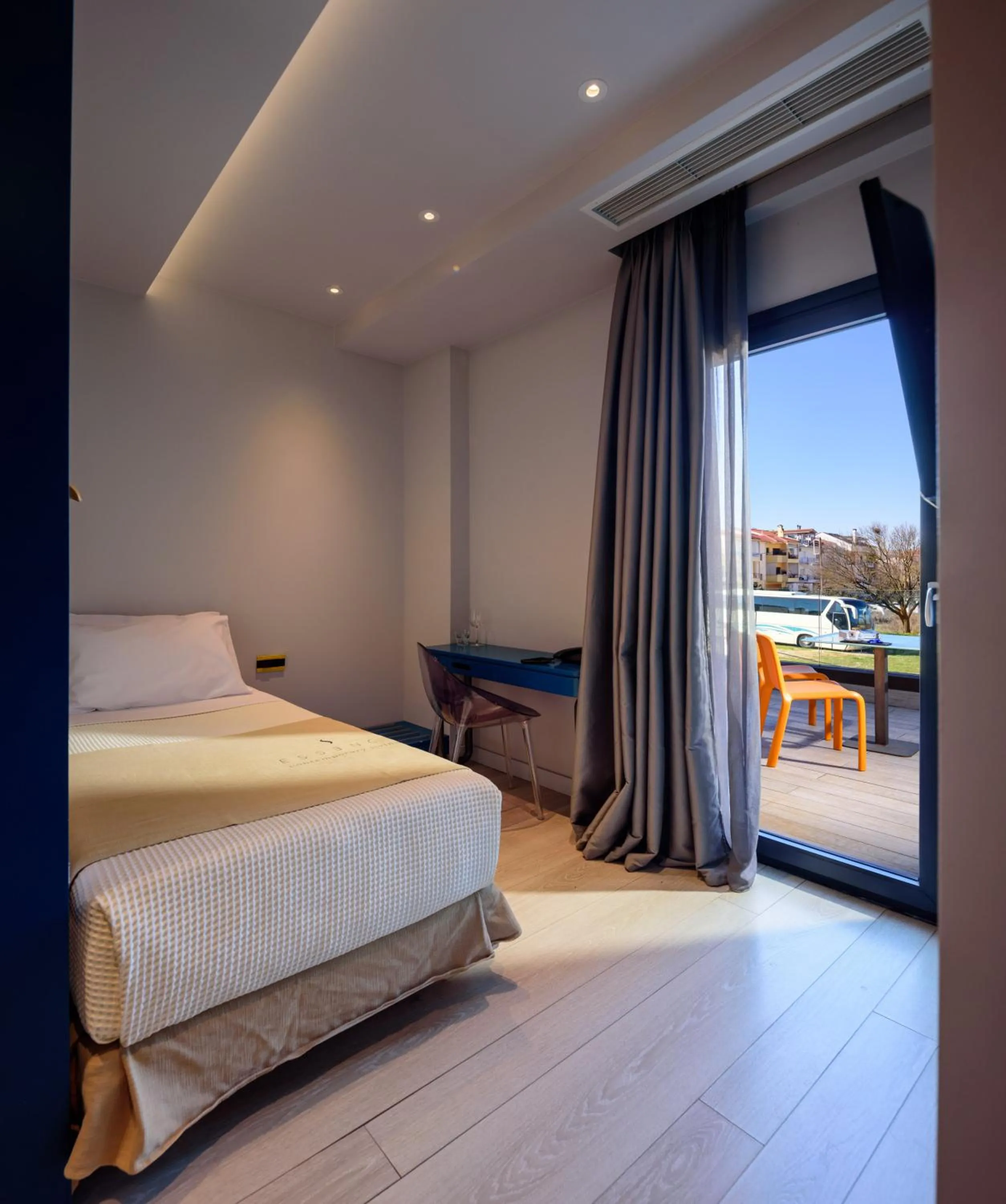 Bed in Essence Hotel