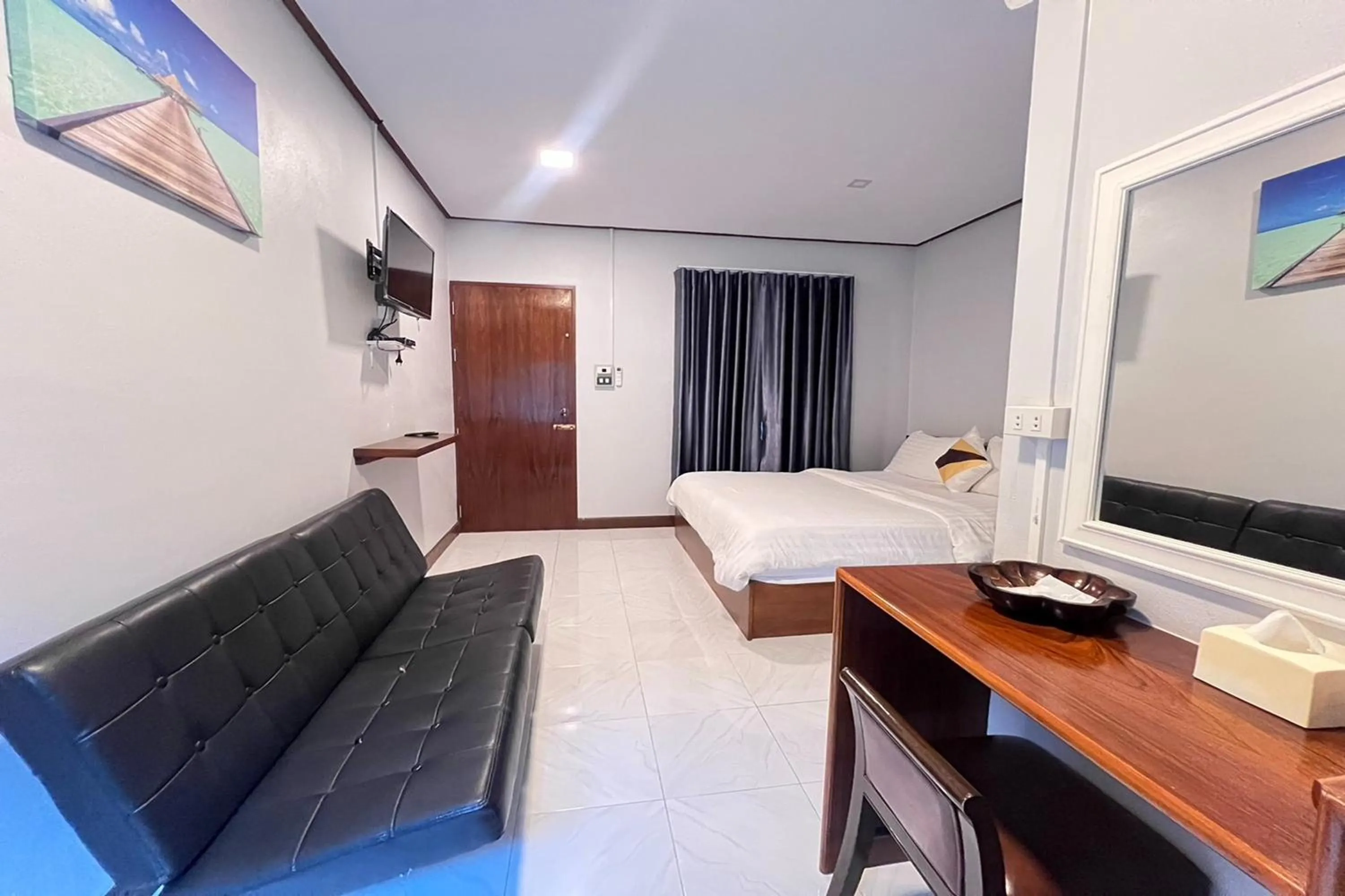 Bed in Lan Bua Resort