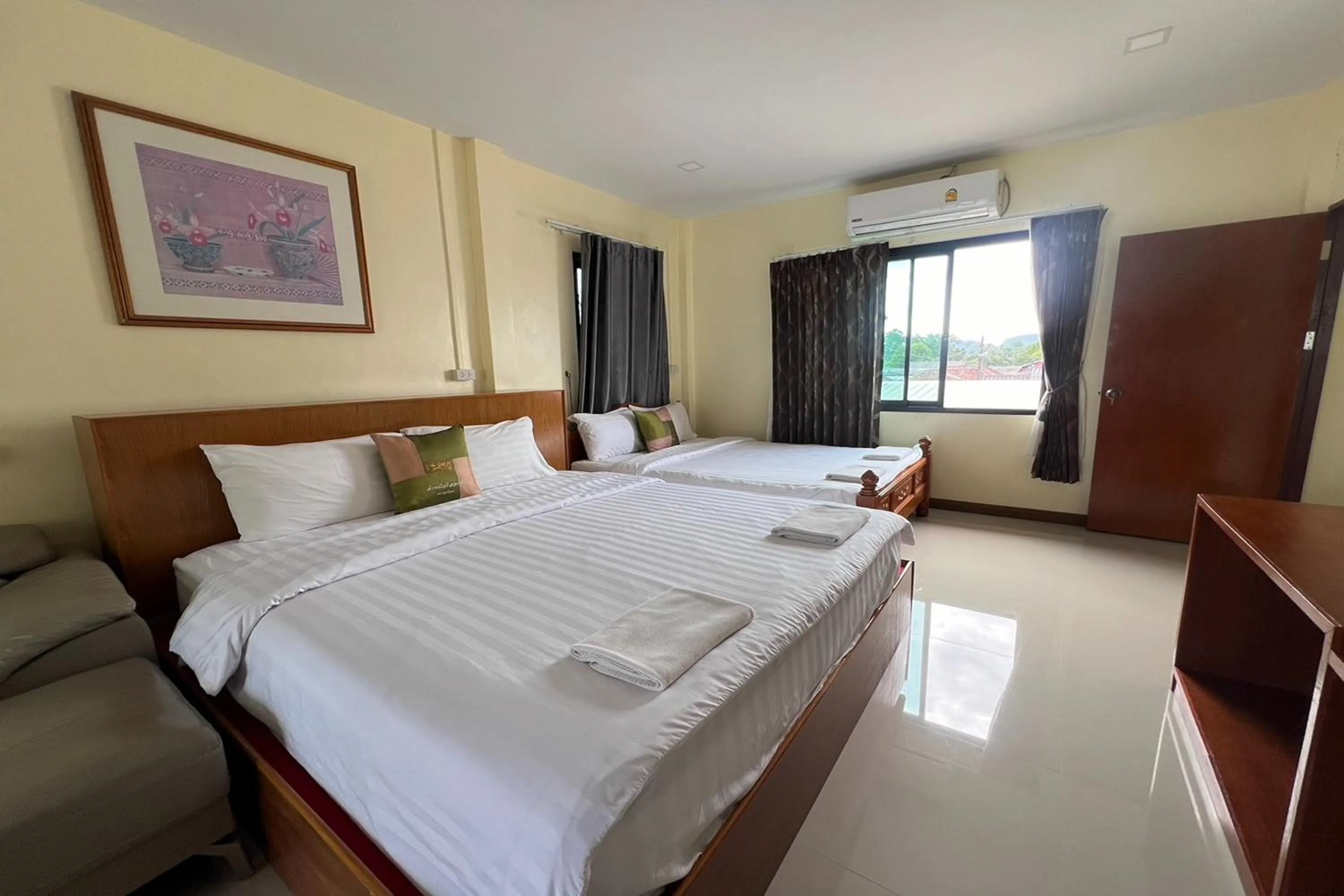 Bed in Lan Bua Resort