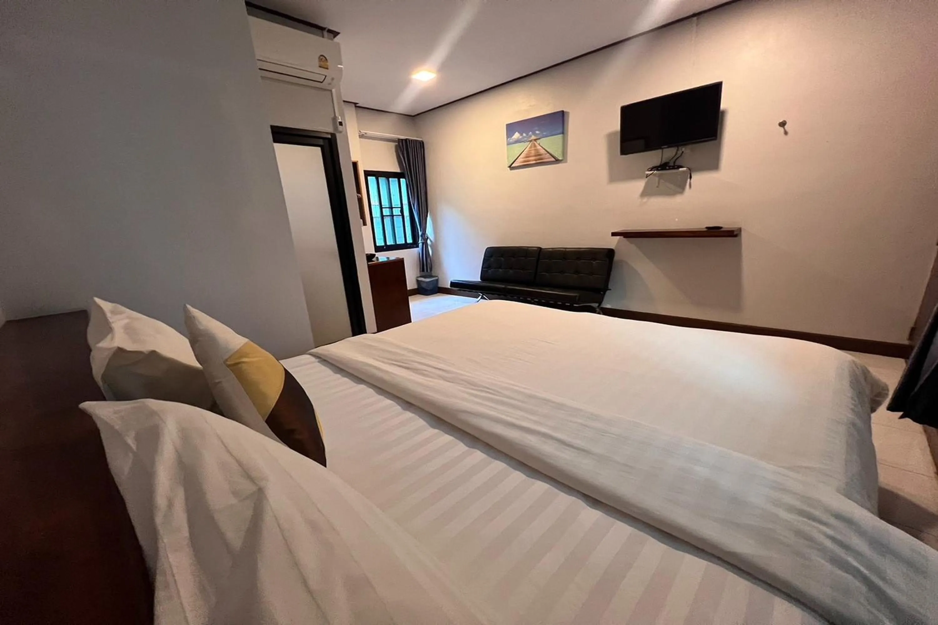 Bed in Lan Bua Resort