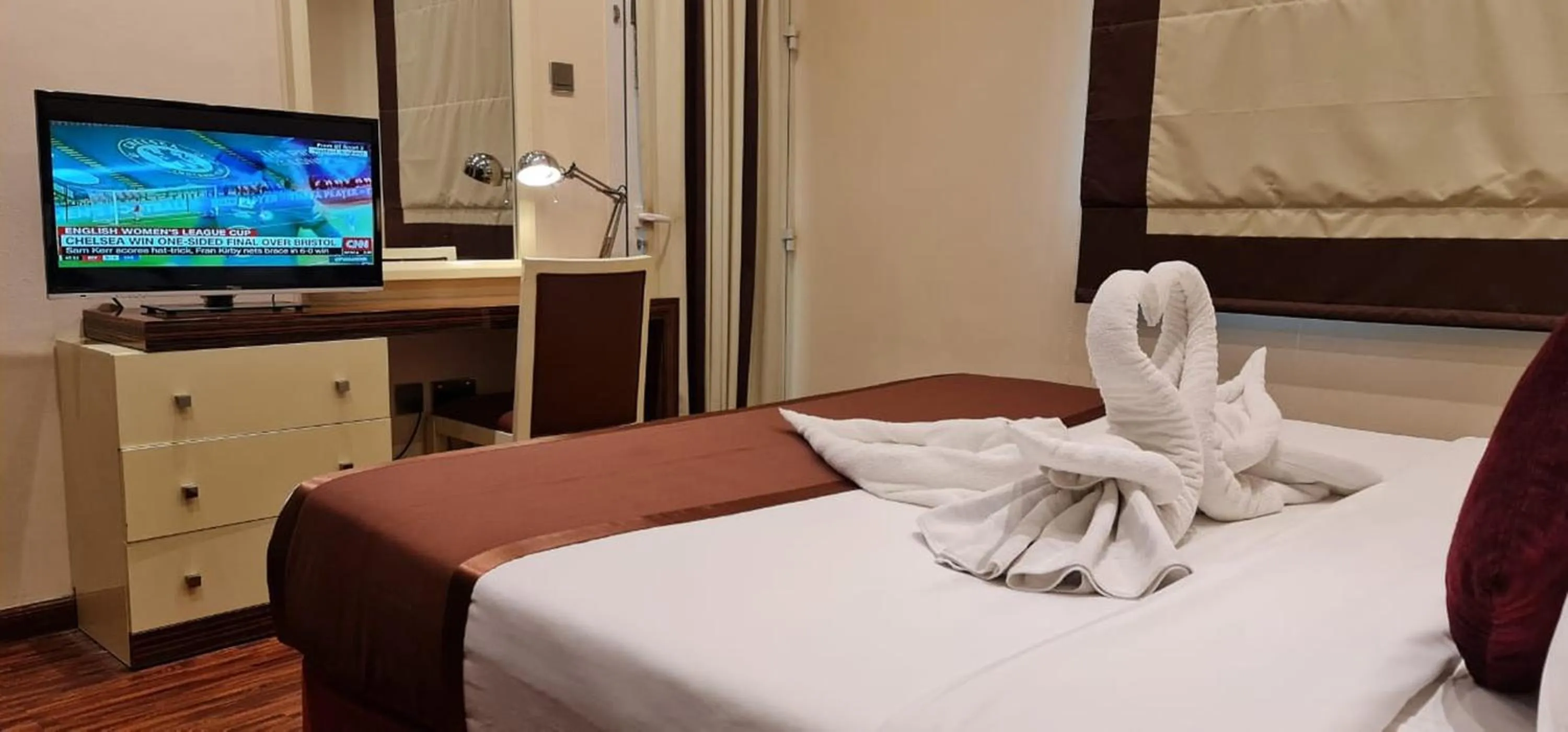 Communal lounge/ TV room, TV/Entertainment Center in The View Al Barsha Hotel Apartments