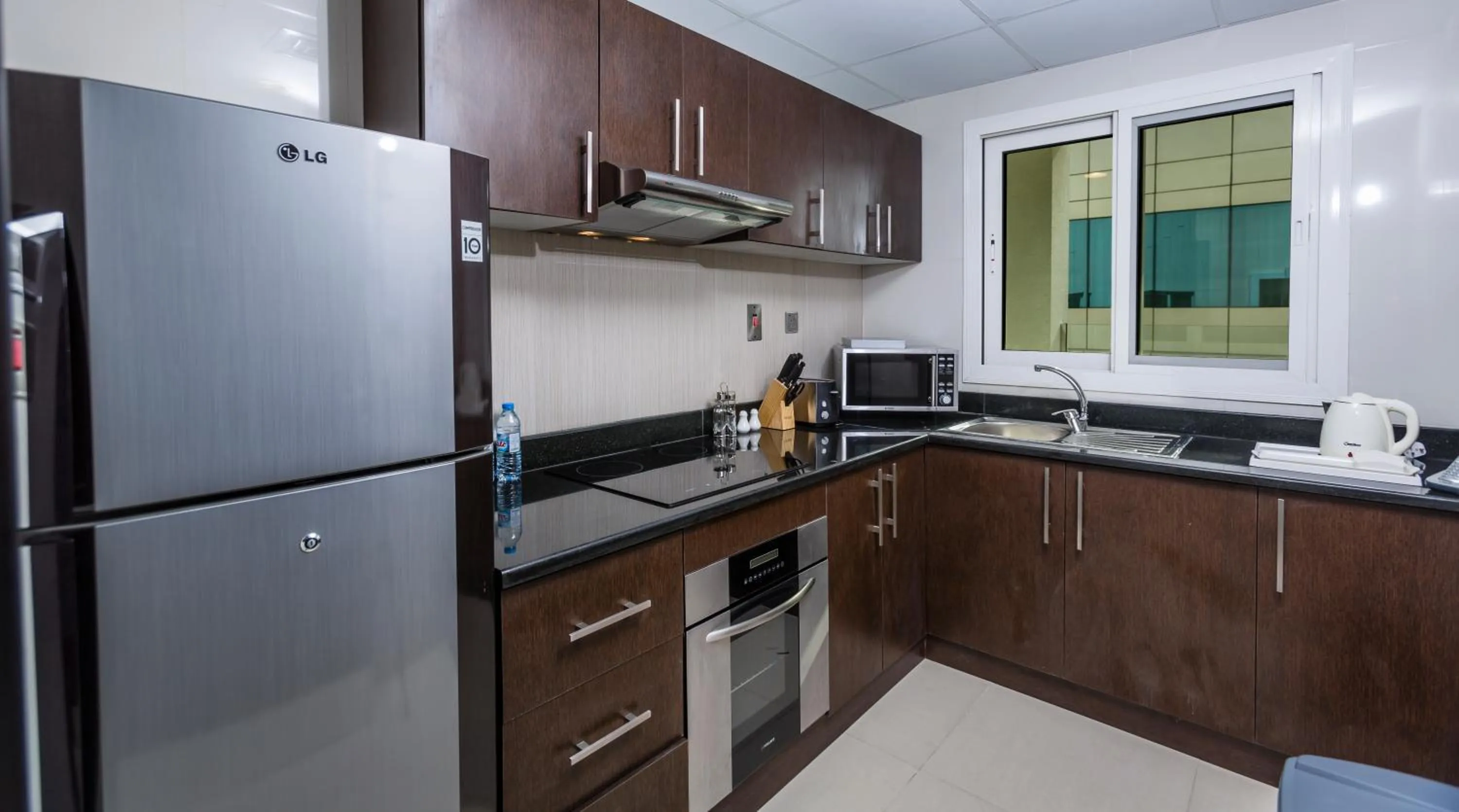 Kitchen or kitchenette, Kitchen/Kitchenette in The View Al Barsha Hotel Apartments