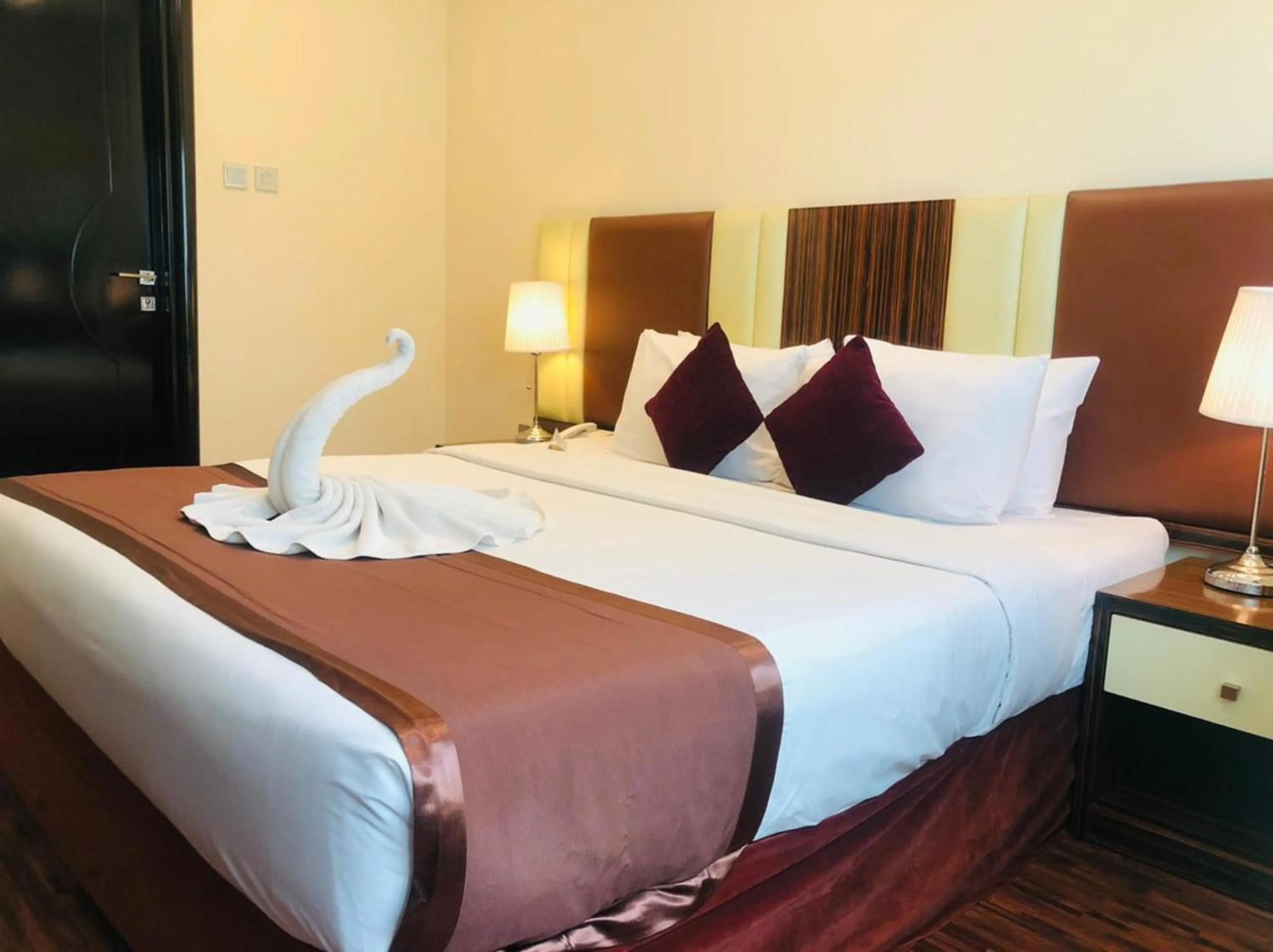 Bed in The View Al Barsha Hotel Apartments