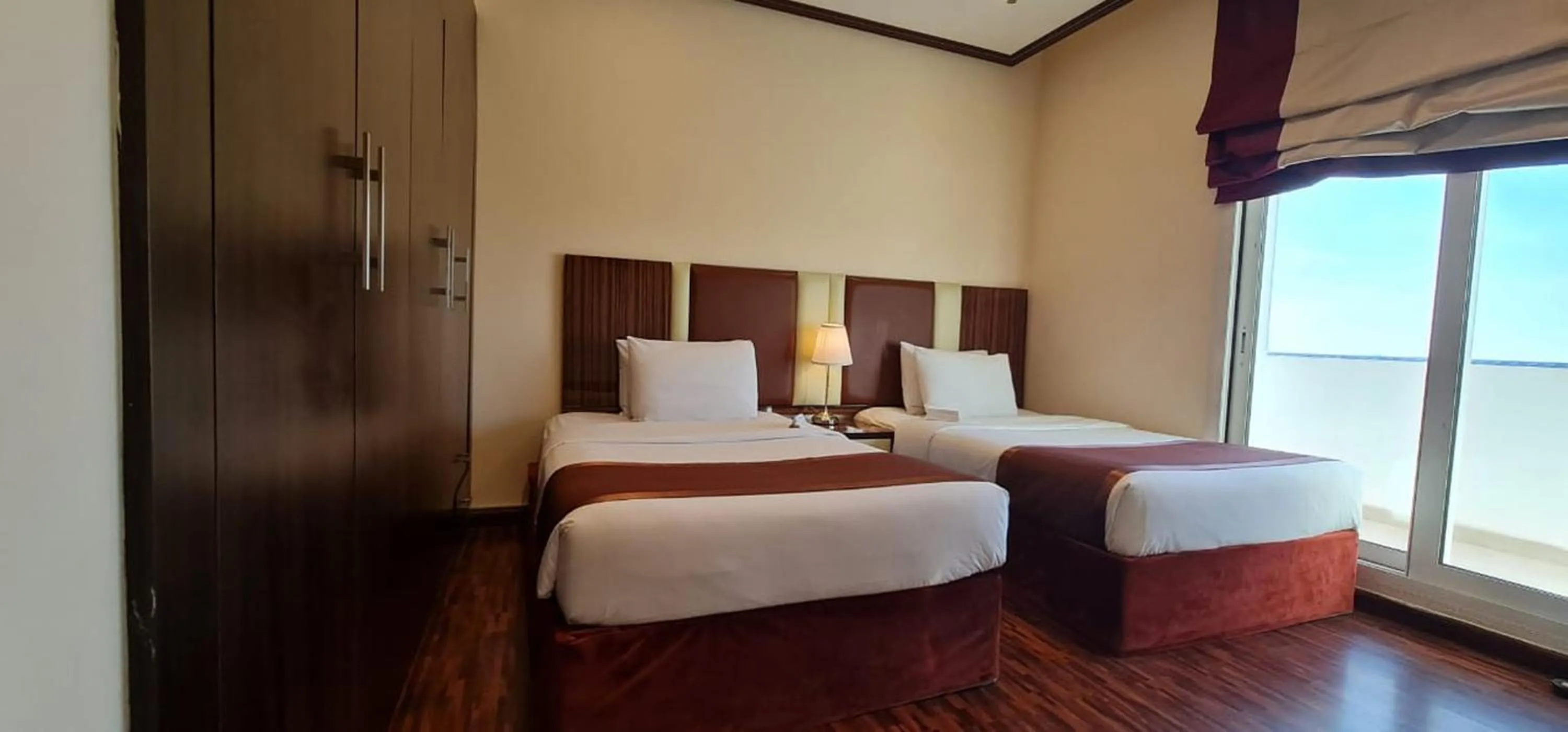 Bed in The View Al Barsha Hotel Apartments