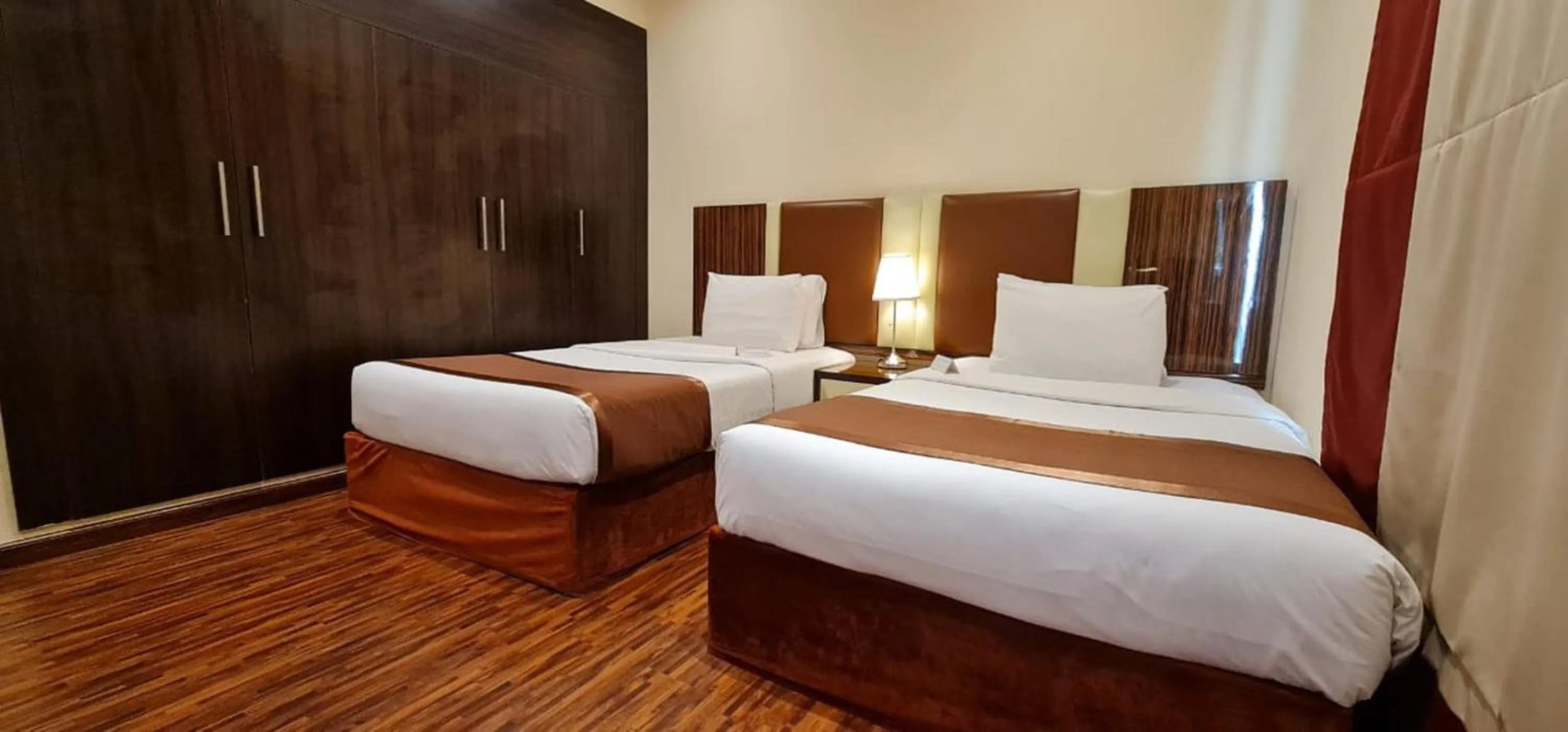 Bed in The View Al Barsha Hotel Apartments