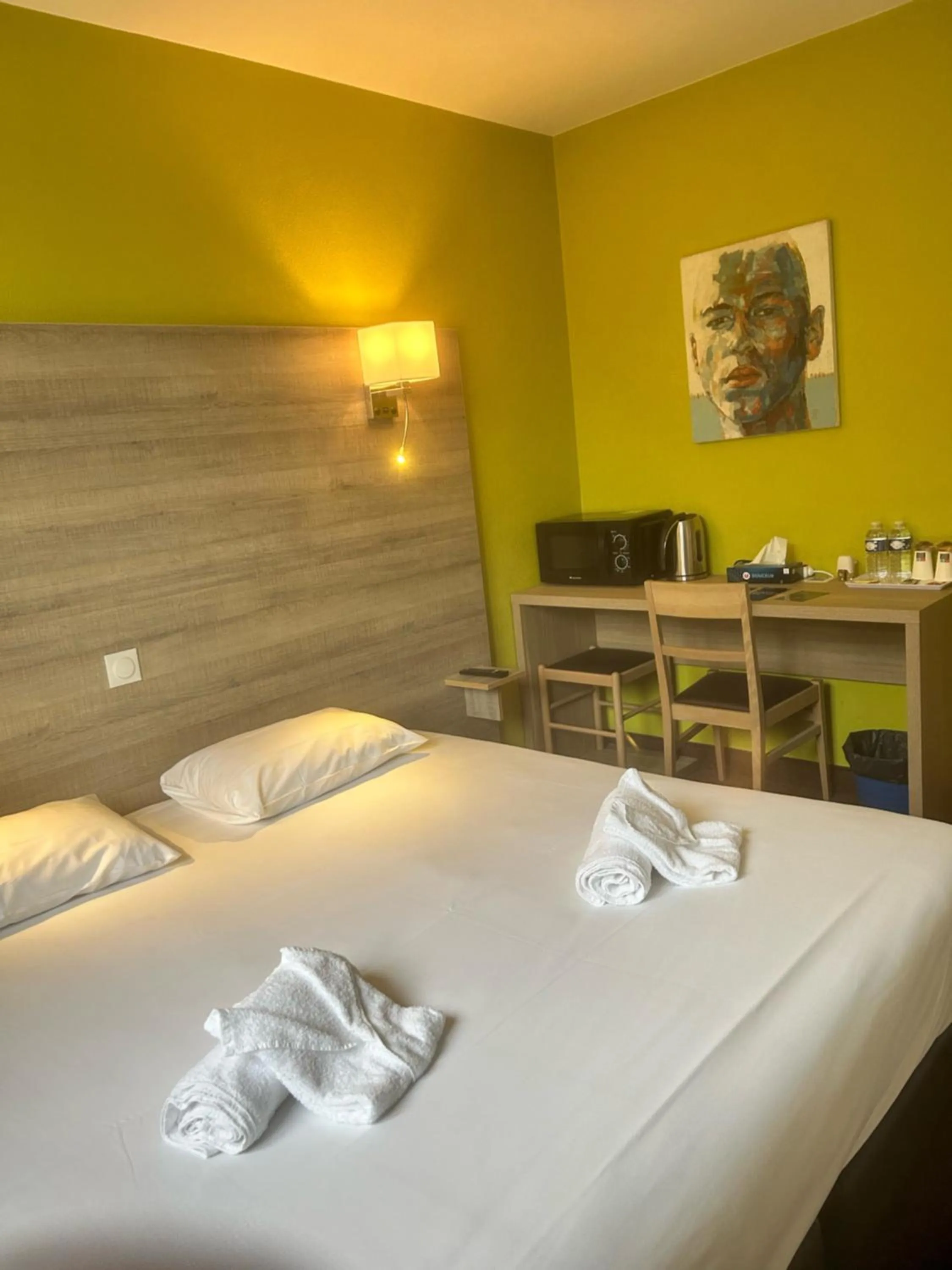 Bed in Hôtel Particulier LE MAS DES MARAIS